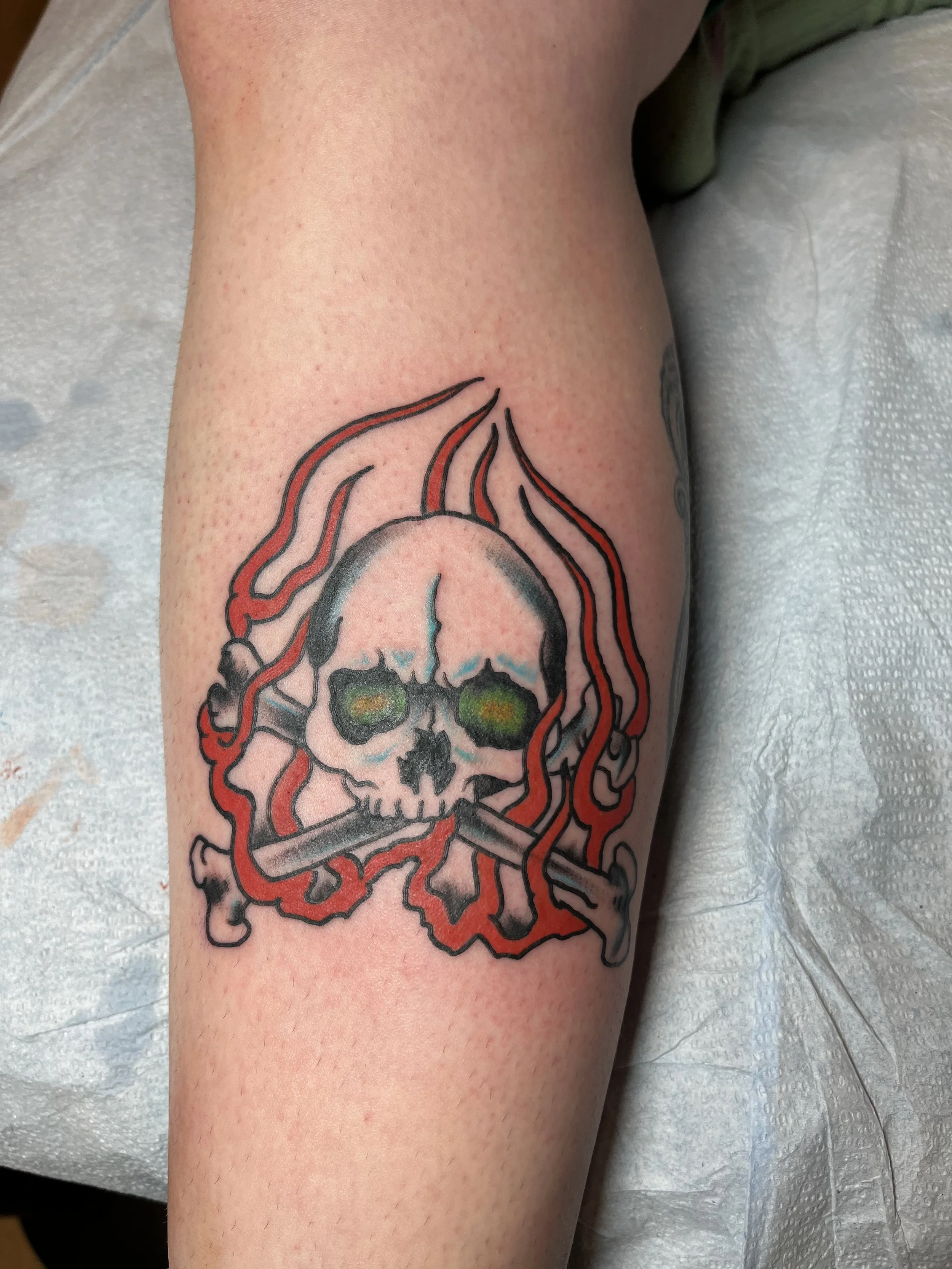 Julius-Forte-Tattoo-Portfolio-Brooklyn-Flaming-Skull-Calf-Tattoo.jpg