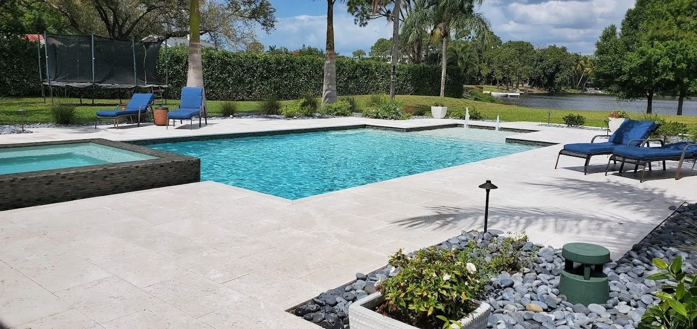 Cleaning a travertine pool deck in Miami, FL