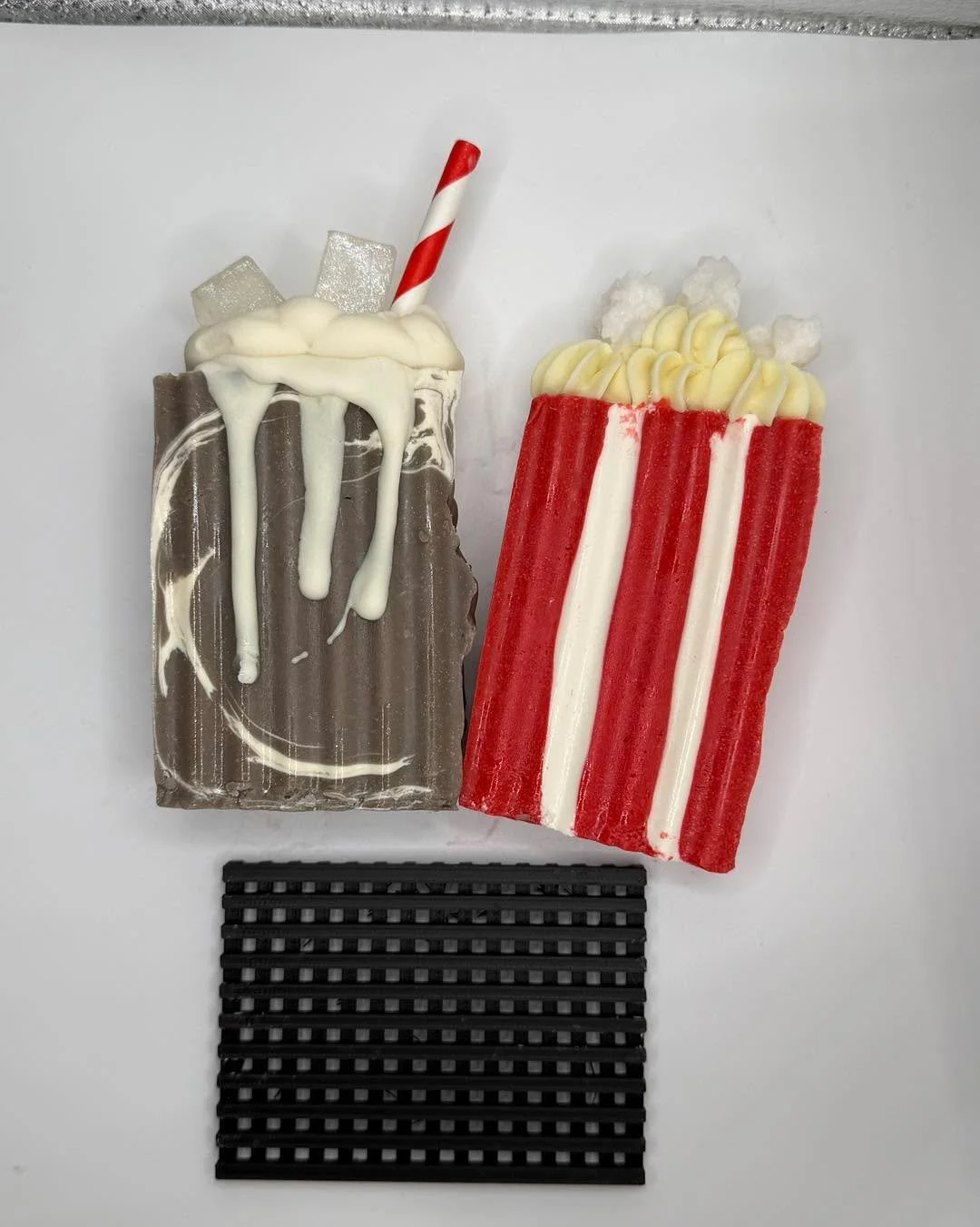 NEW SOAP SET:

Two 6 oz bars of soap and a soap tray.

A Gentle Soap that lathers well and is great for sensitive skin.

Scent Notes:

Popcorn Soap: The delicious aroma of freshly popped popcorn with rich creamy butter.

Cola Soap: The aroma of carbo