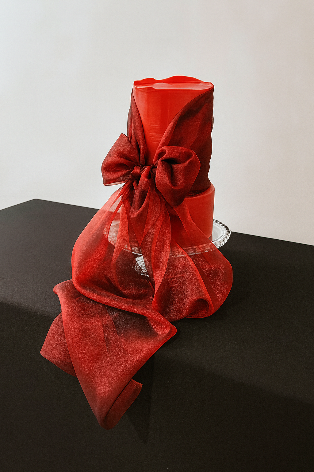 Custom tiered cake with Red Bow accent