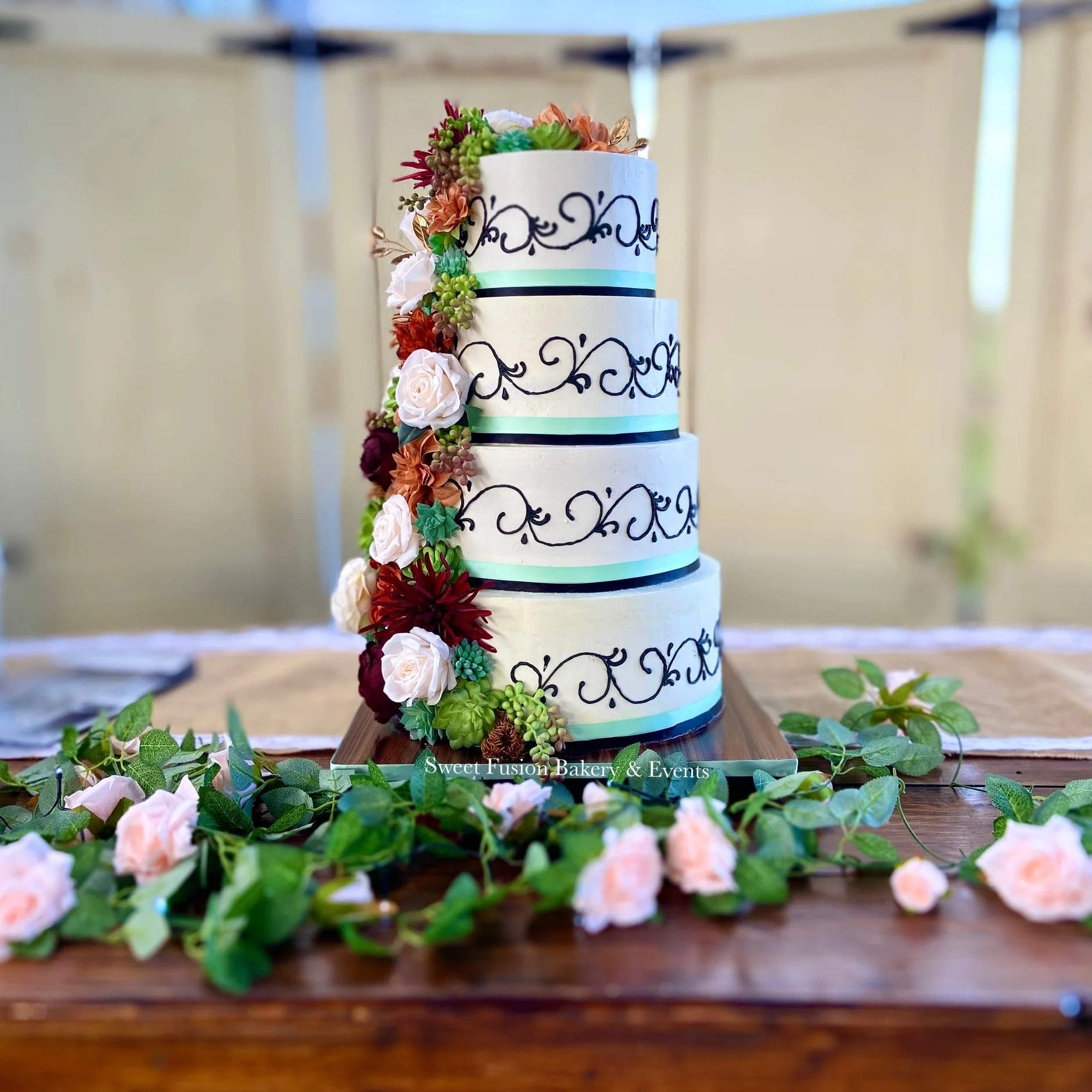 Black filligree cake.JPEG