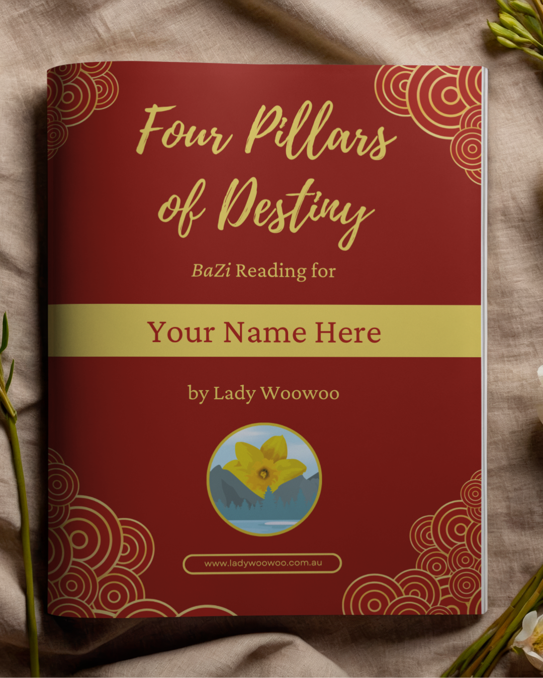 A red 'Four Pillars of Destiny' booklet against a natural linen backdrop.