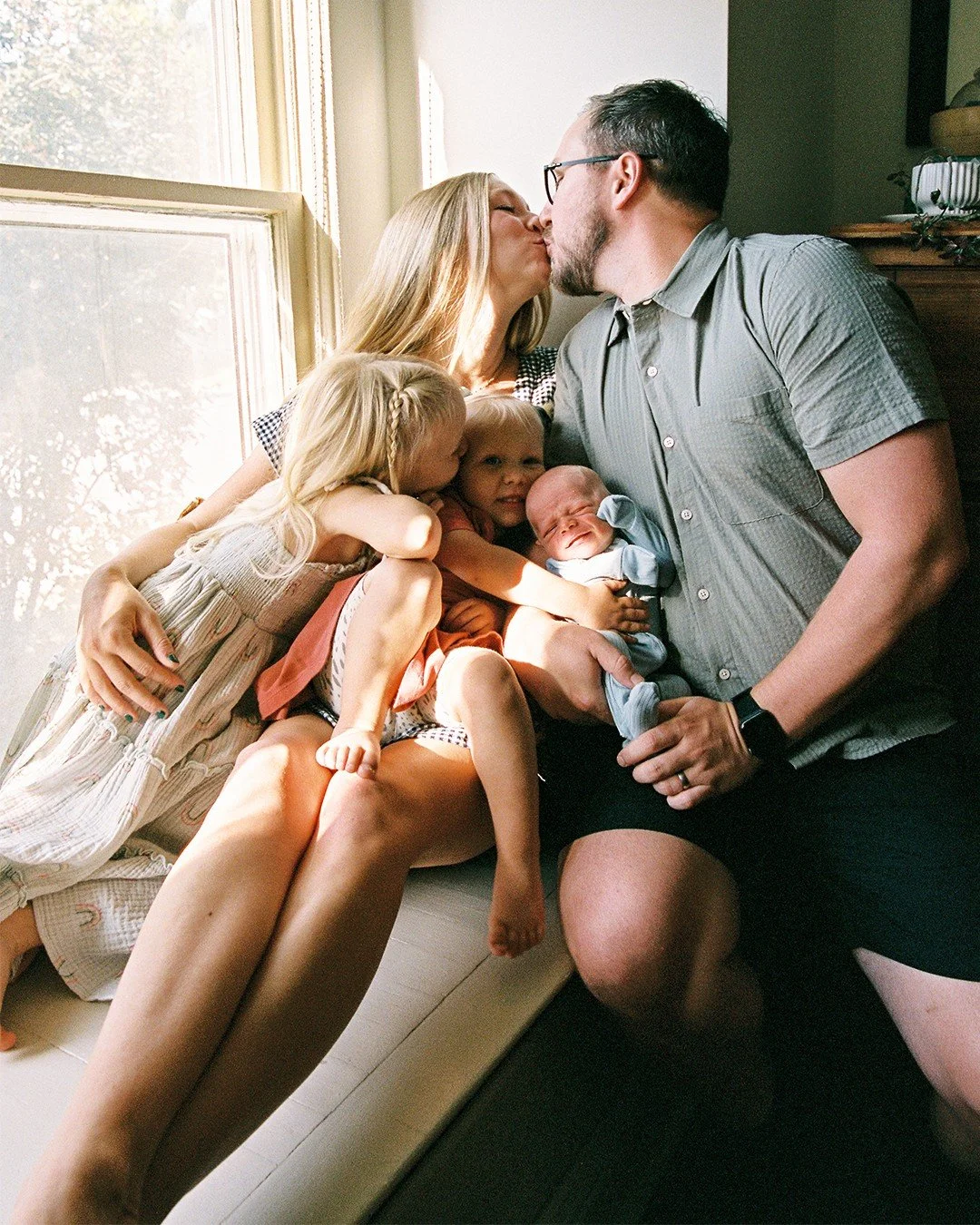 My bombshell friend and her lovable family in their charming Kansas City home, the summer they welcomed their third &lt;3&lt;3&lt;3&lt;3&lt;3

Enchanting light (and a photographer who can spot it) is really all you need to make sure your in-home phot