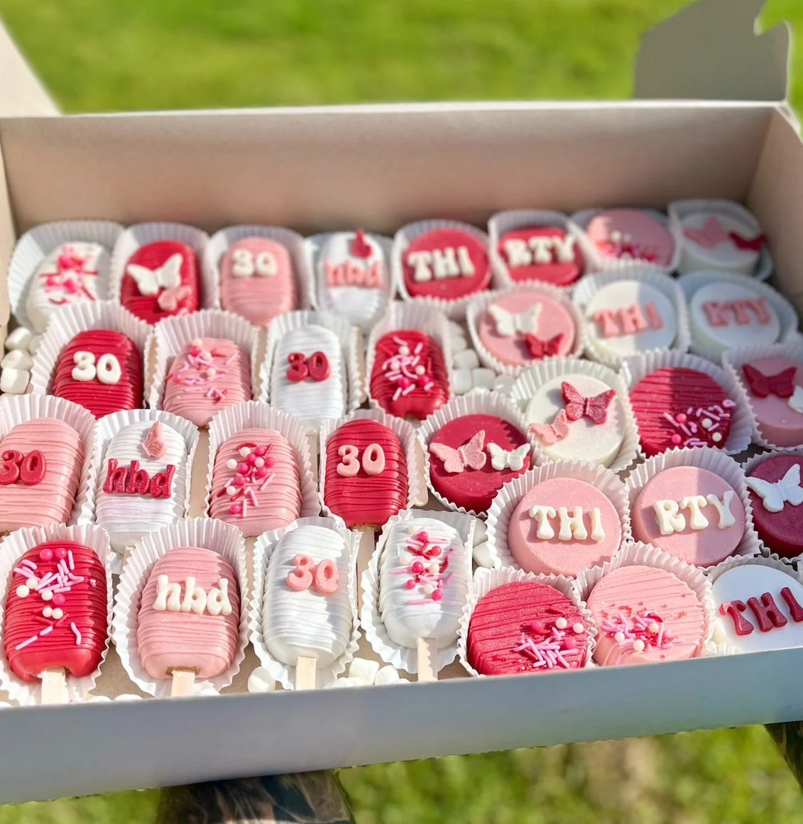 Birthday party custom cake pops and chocolate covered oreos