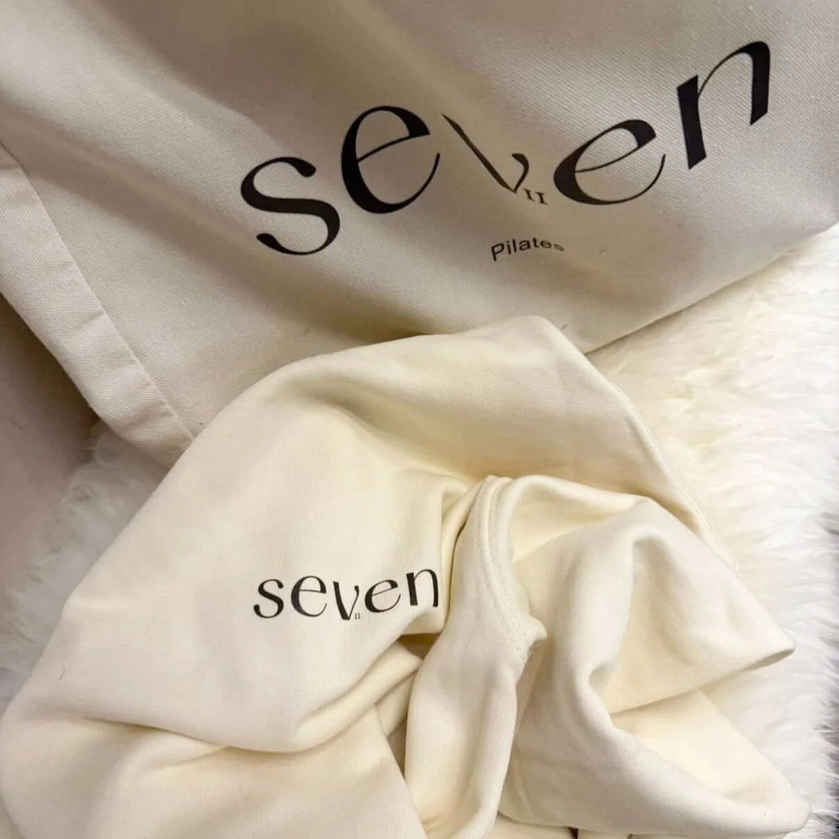 Looking for custom merchandise that goes beyond grip socks? 🤍

@seven.pilates.vii &mdash; clean, minimal, and effortlessly elevated.

Their custom cream tote bags and jumpers are the perfect extension of the studio &mdash; soft tones, premium feel, 