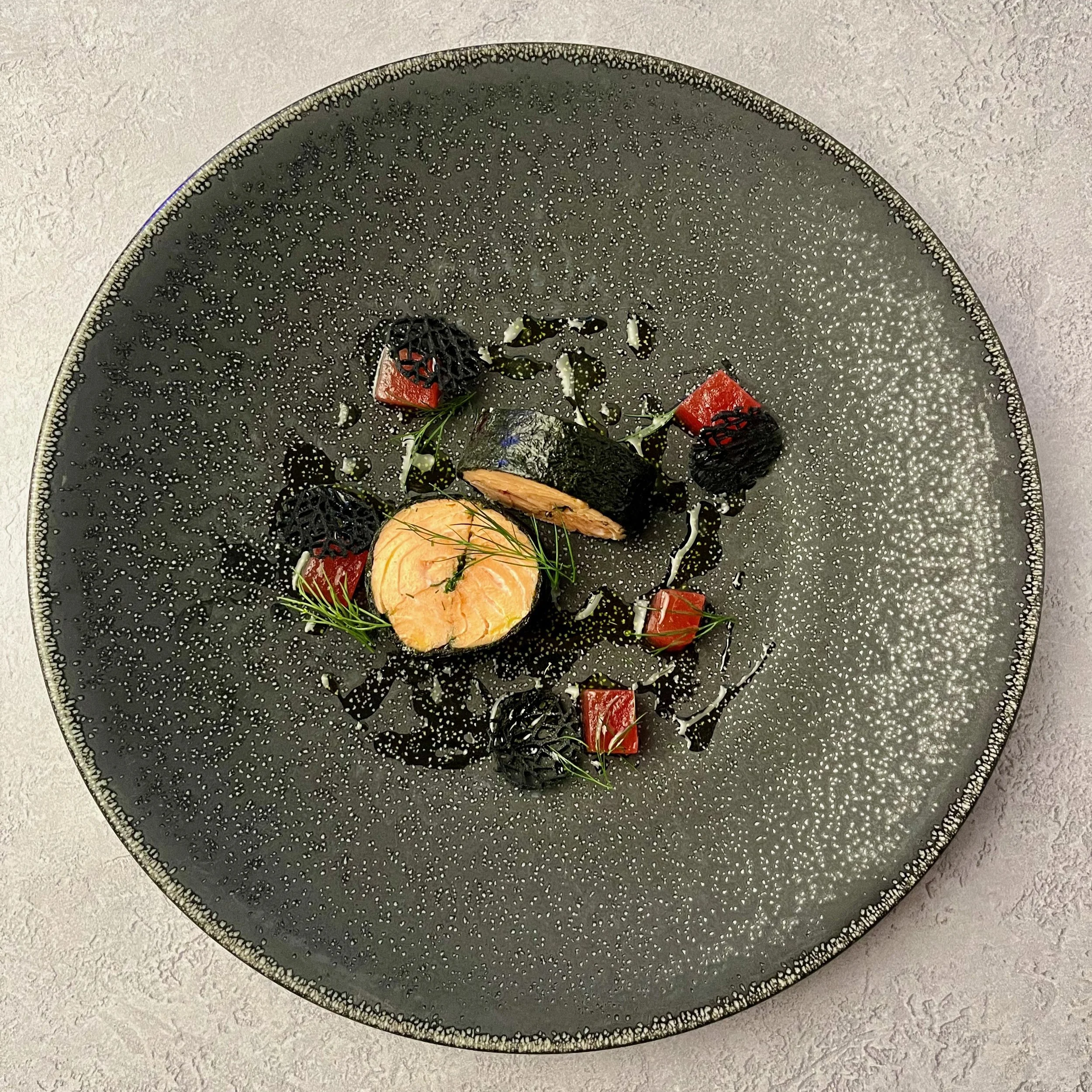 Sea trout nori seaweed Watermelon, sesame oil, black sesame, yuzu, and coriander