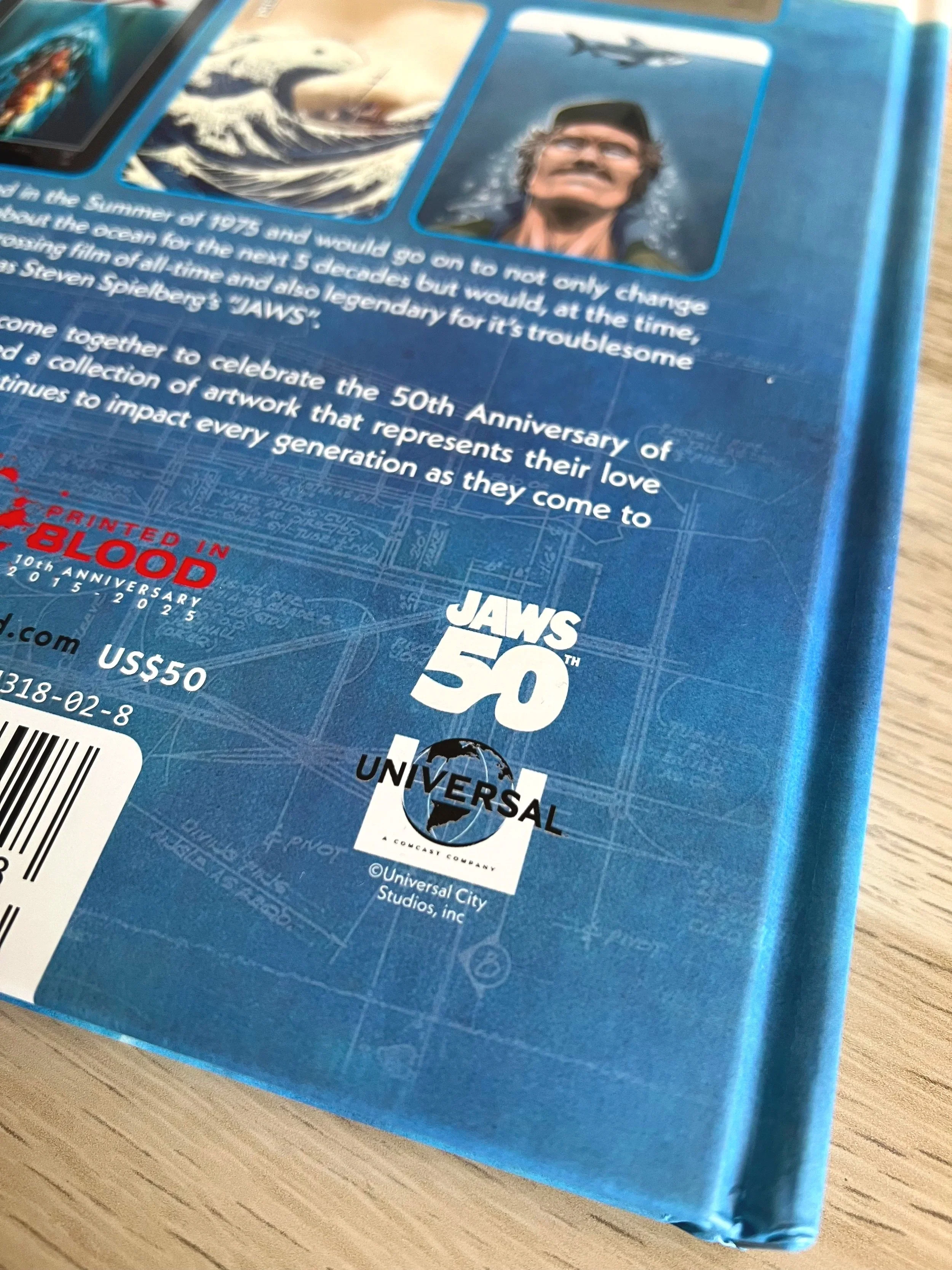 illustration-movie-poster-jaws-artbook-50th-anniversary-book-logo-detail-salmorejo-studio.jpg
