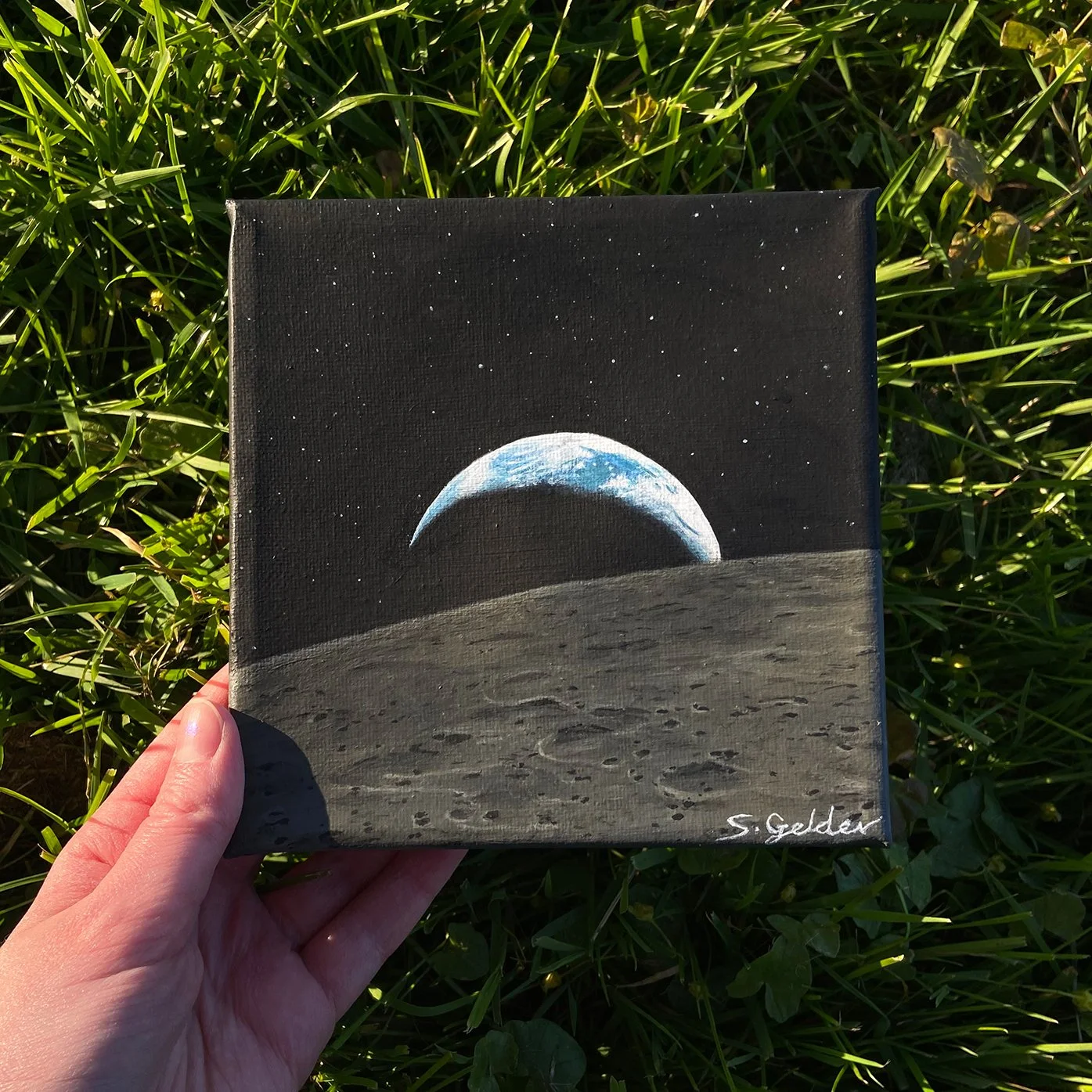 holding earthset.50.square.jpg