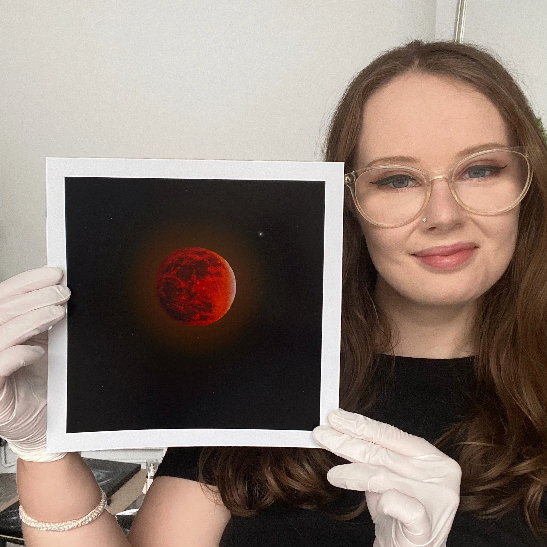 me holding blood moon print.jpg