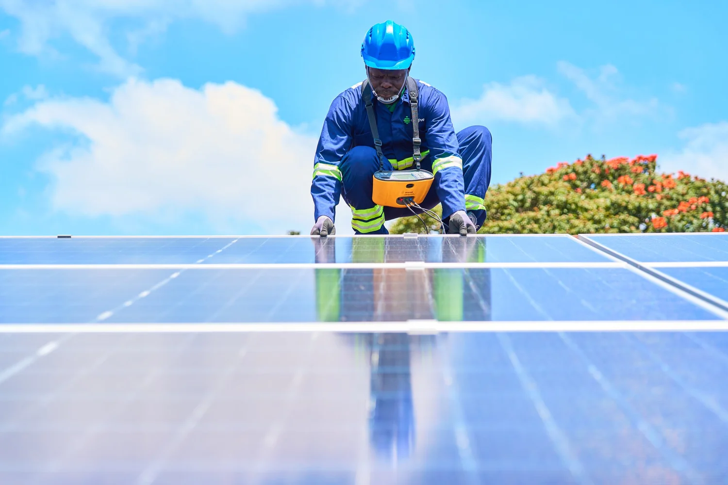 AM Power Solar engineer installing a solar panel