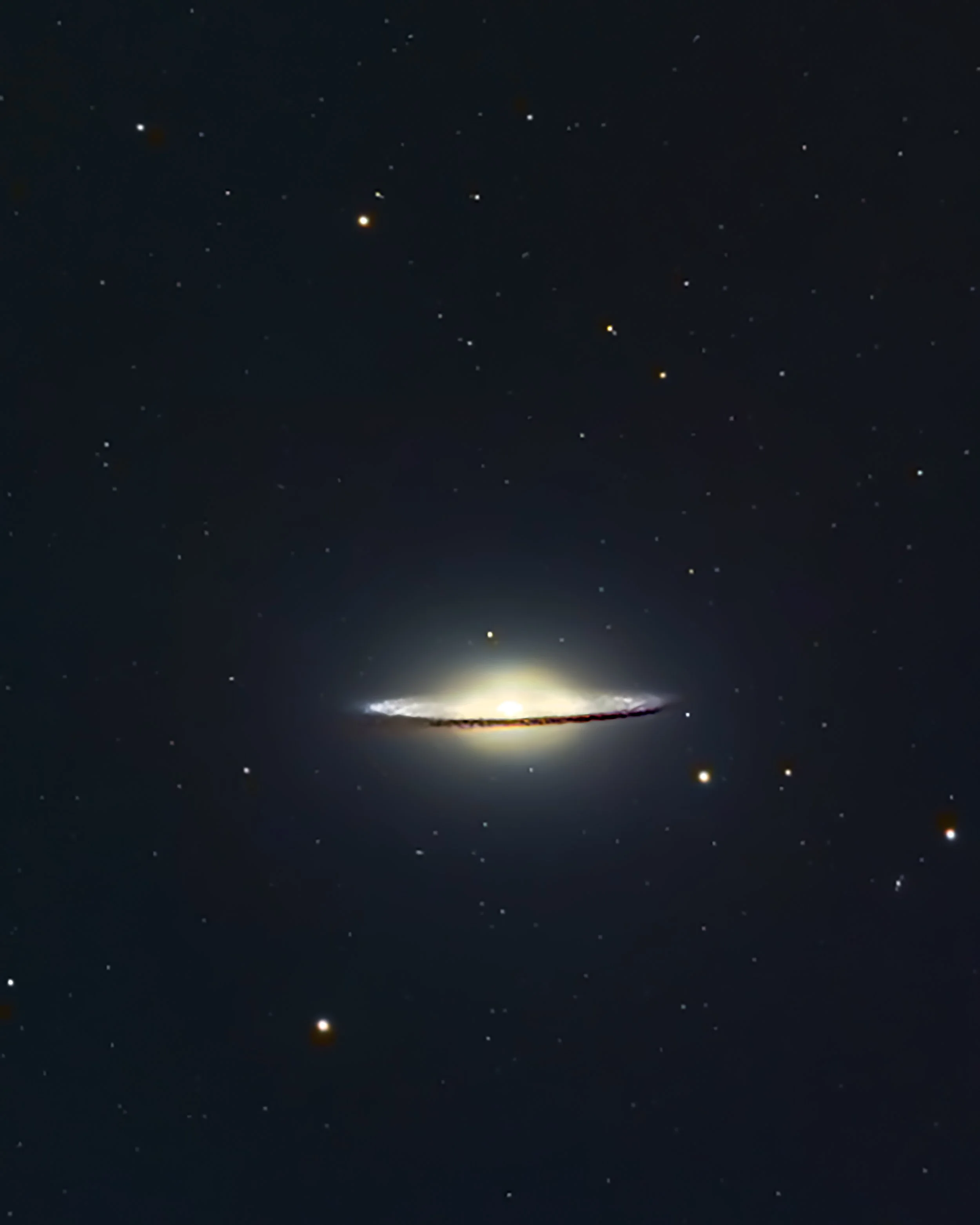 The Sombrero Galaxy (also known as Messier Object 104, M104 or NGC 4594) is a peculiar galaxy of unclear classification