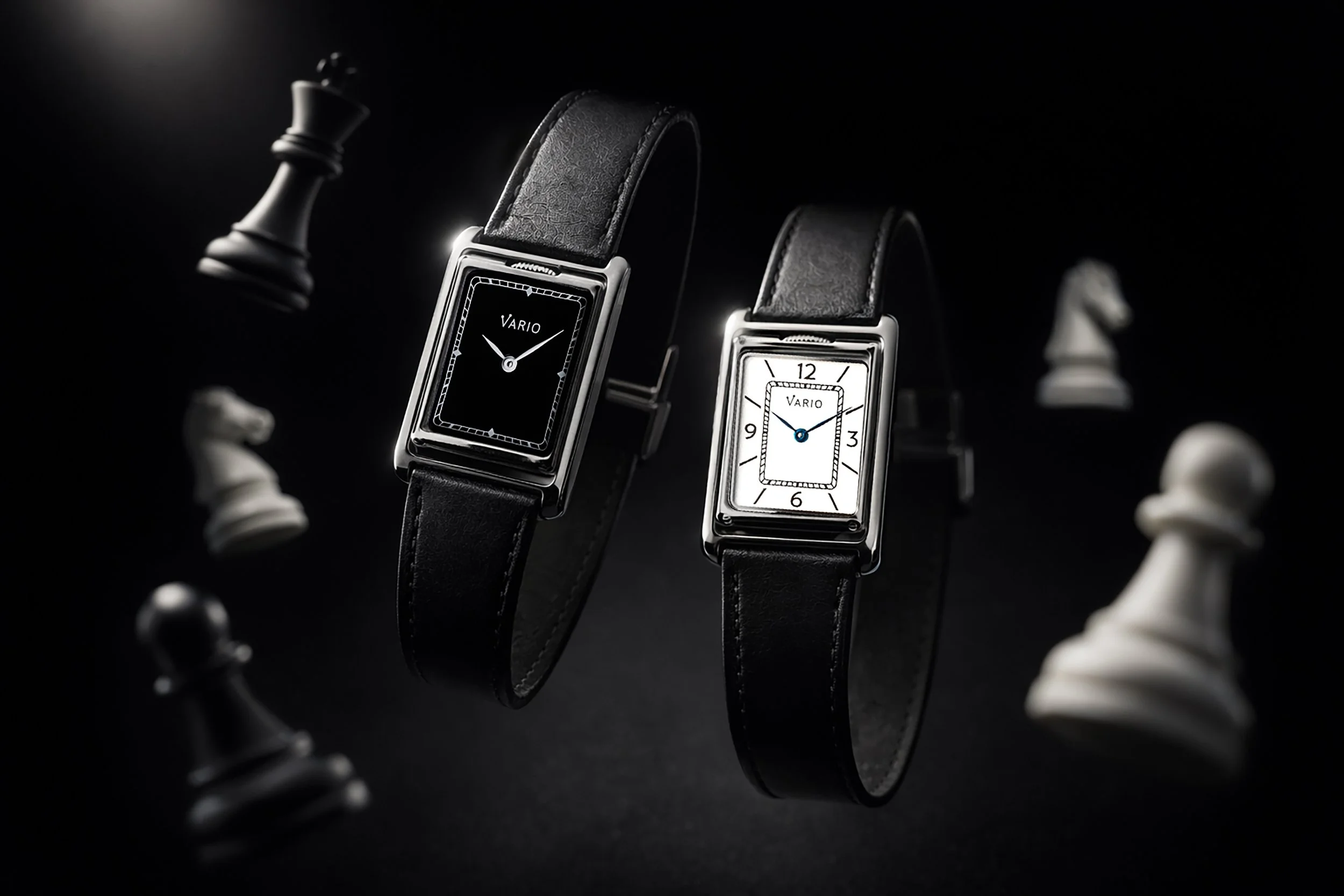 Two rectangular wristwatches with black leather straps, one with a black face displaying the brand name 'VARIO' and the other with a white face also displaying 'VARIO', set against a dark background with chess pieces and blurred chess pawns.