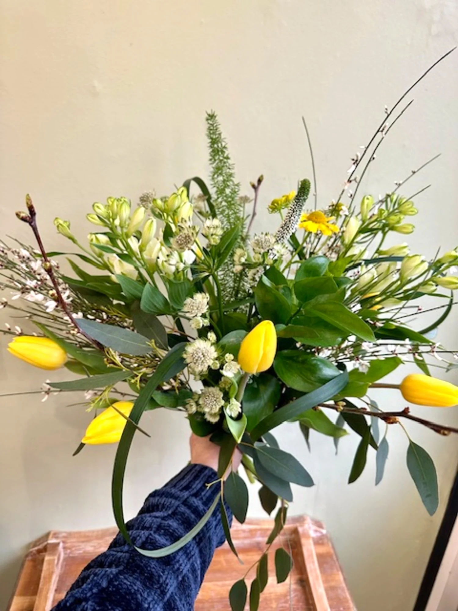 Buttery Garden hand-tied bouquet with warm yellow and cream seasonal flowers