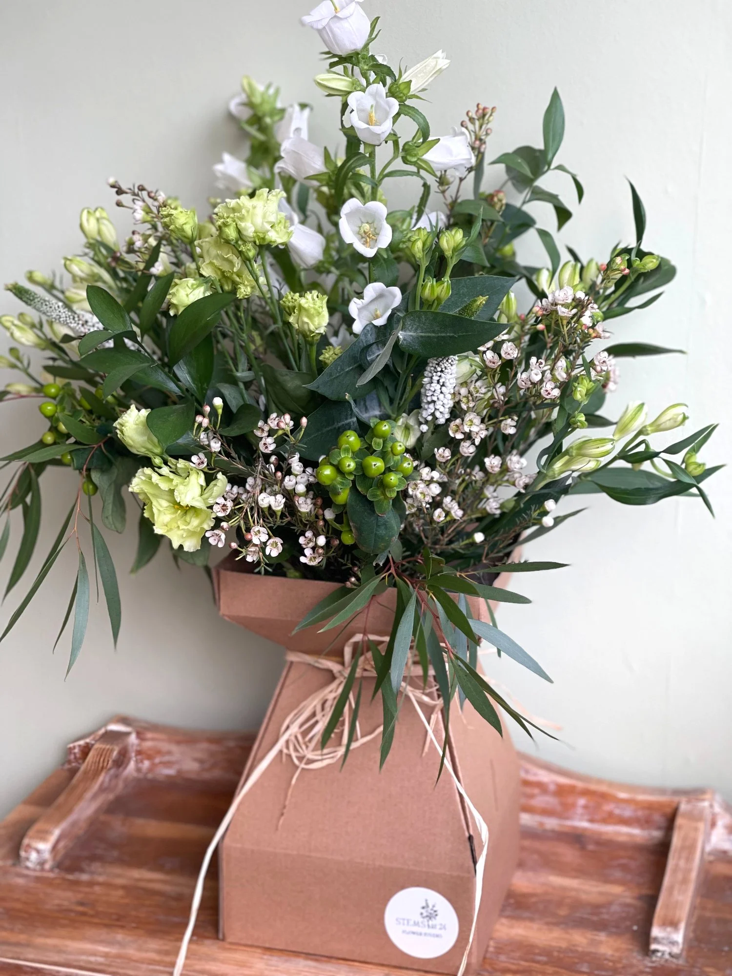 Village Green bouquet by Stems at 24 presented in a recyclable gift box