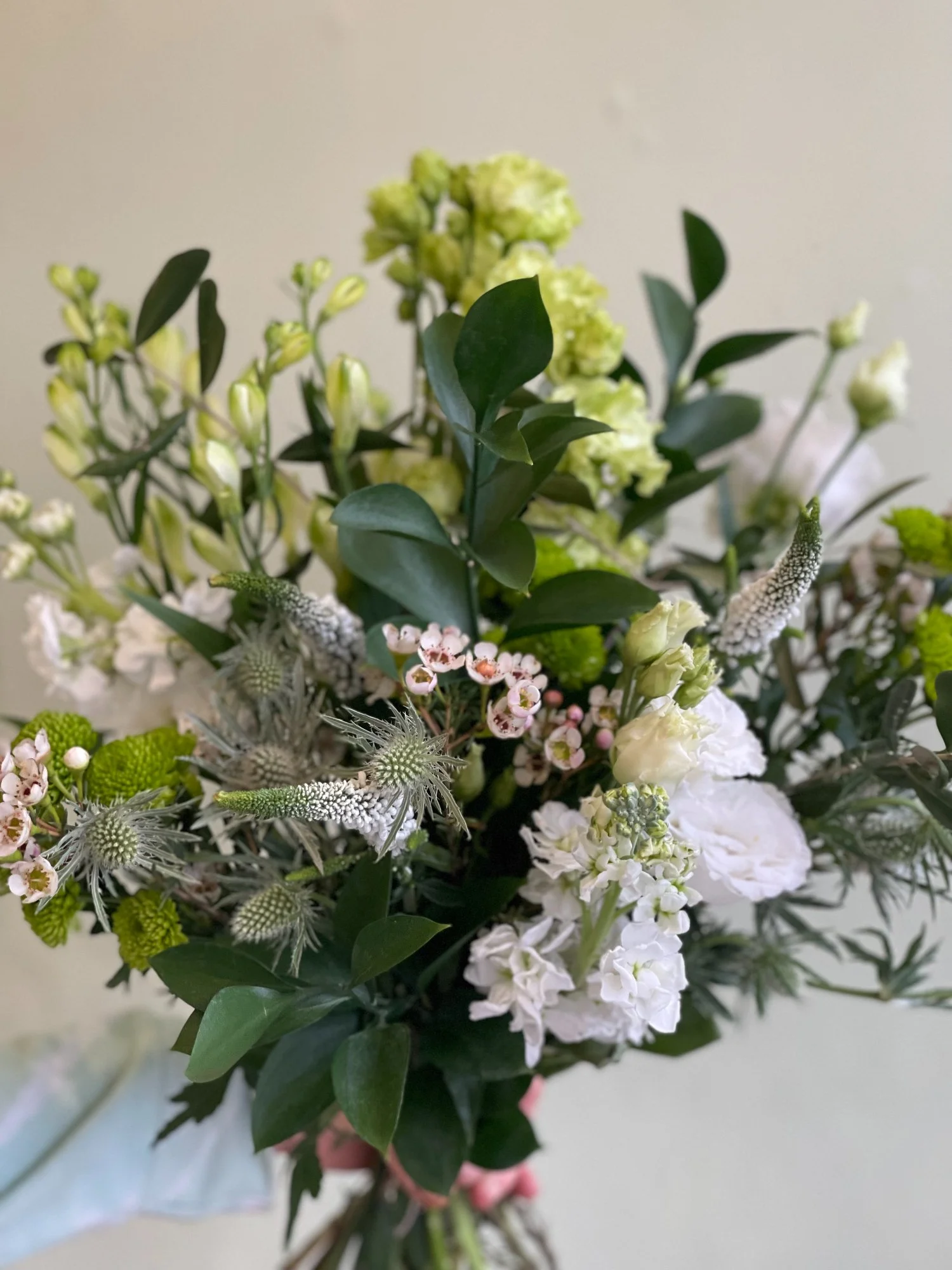 White and green Village Green bouquet in a natural, garden-inspired style