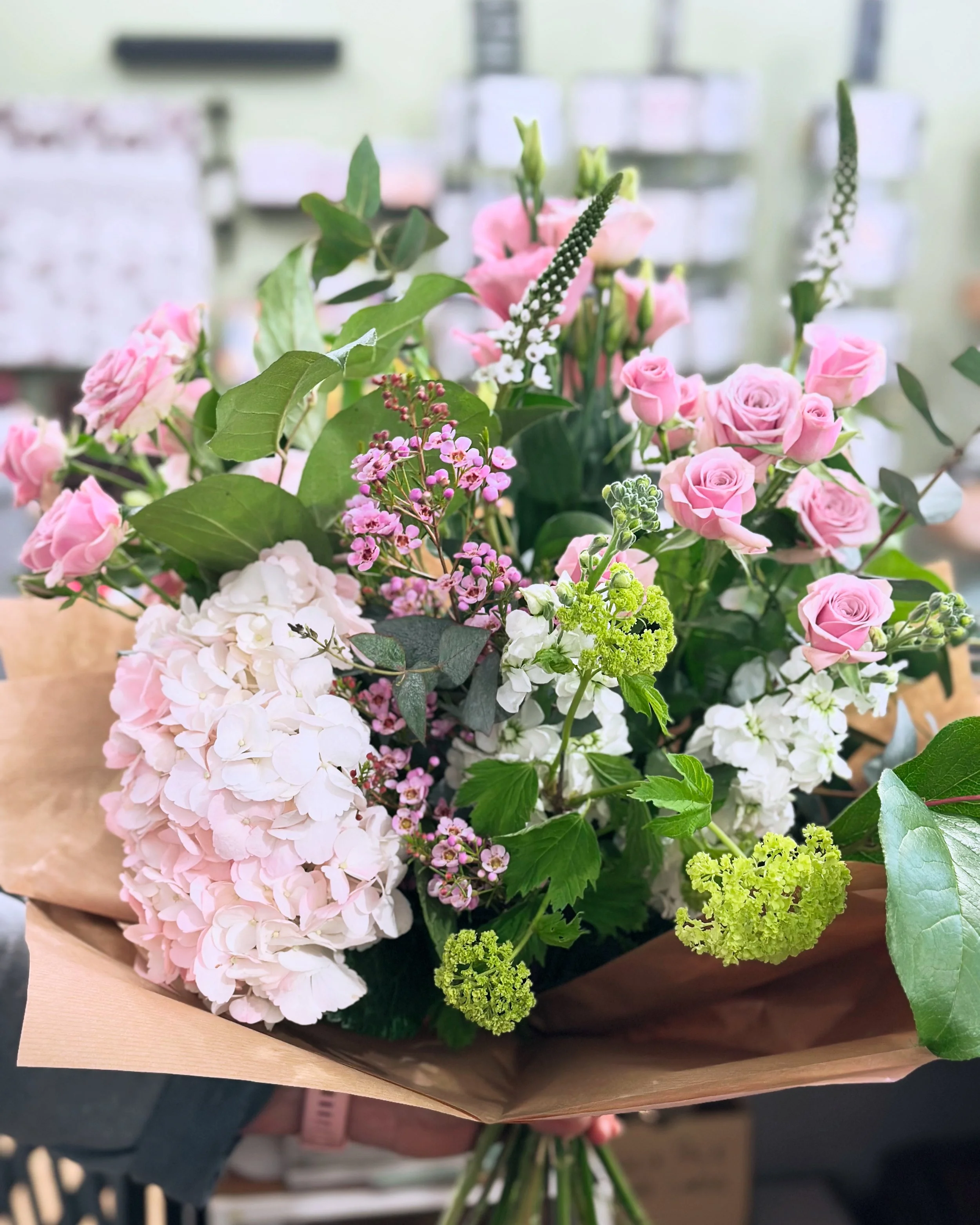 Vicarage Lane bouquet featuring soft tonal pink flowers in a natural, garden-inspired style