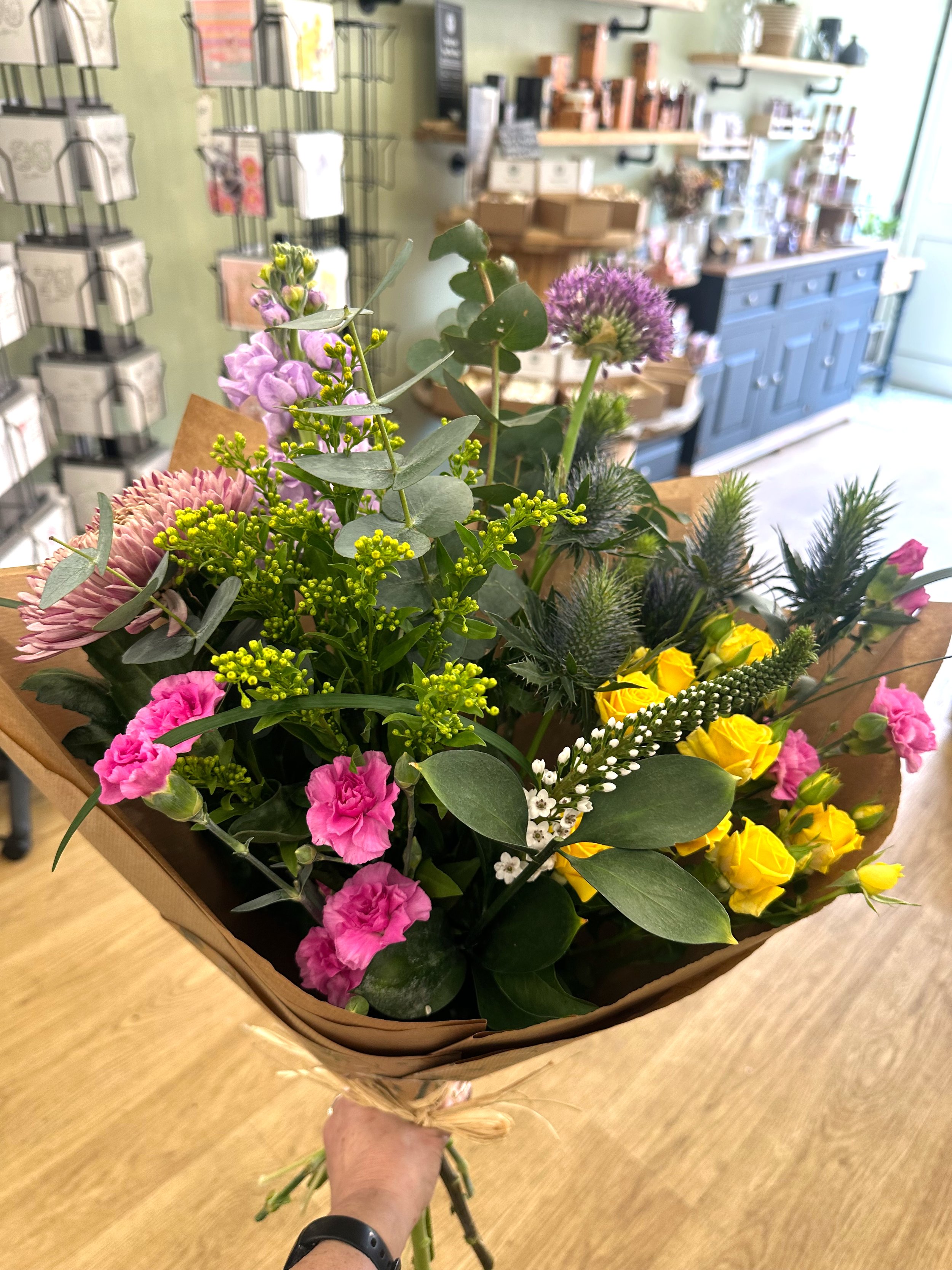 Florist’s Edit bouquet featuring a bespoke mix of seasonal flowers in a natural, garden-inspired style