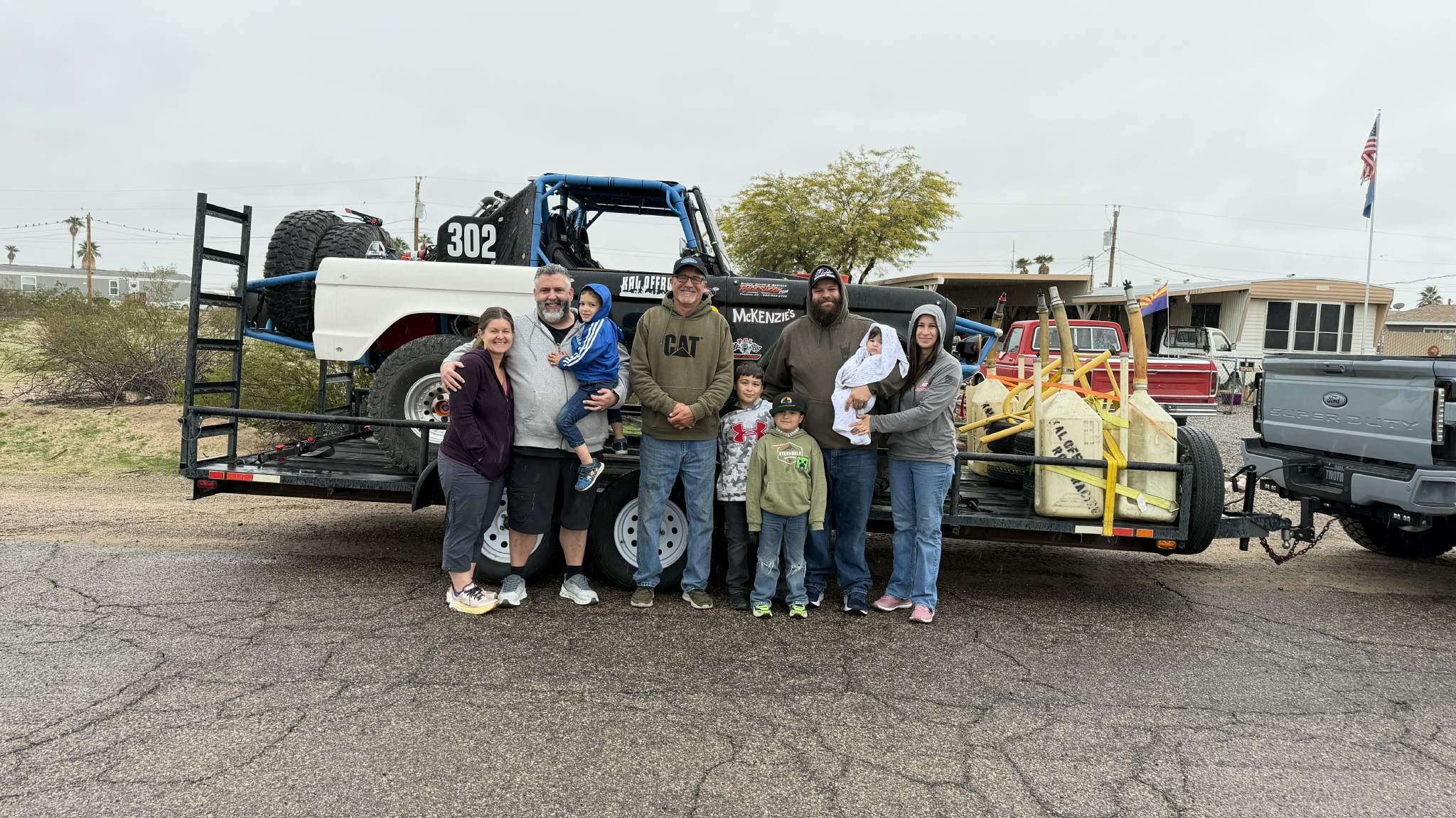 The whole Baja crew standing beside the new race Bronco.