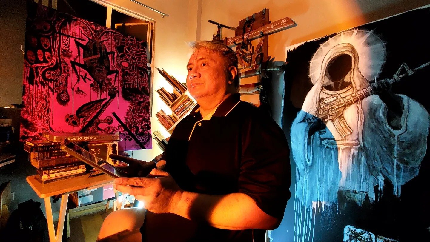 JDL w_ Lourd_s paintings.jpg
