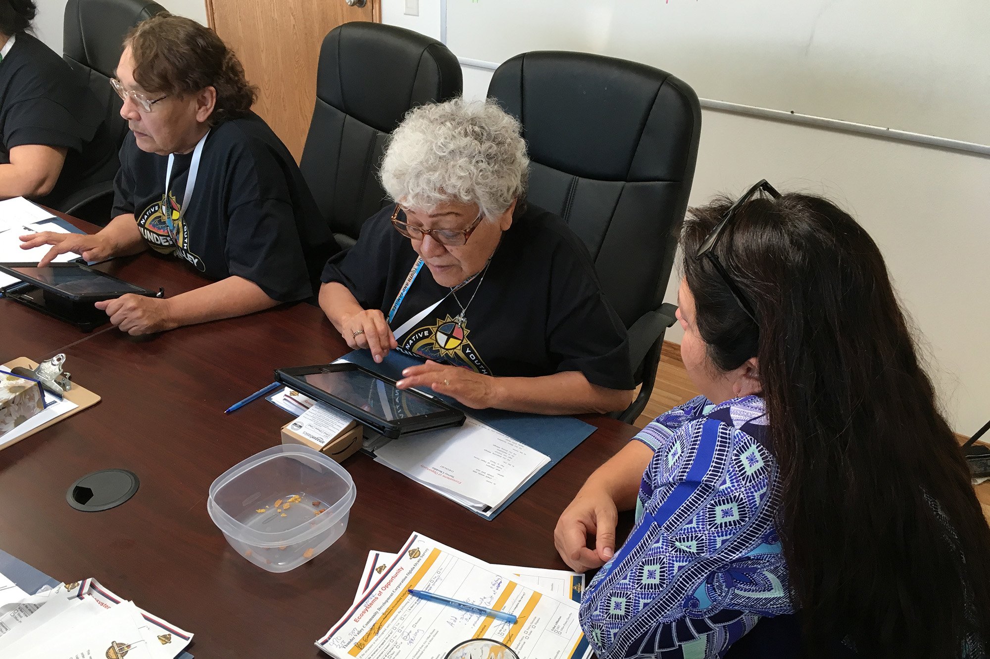 Staff members at Thunder Valley Community Development Corporation receive technical assistance and database training in Porcupine, South Dakota.