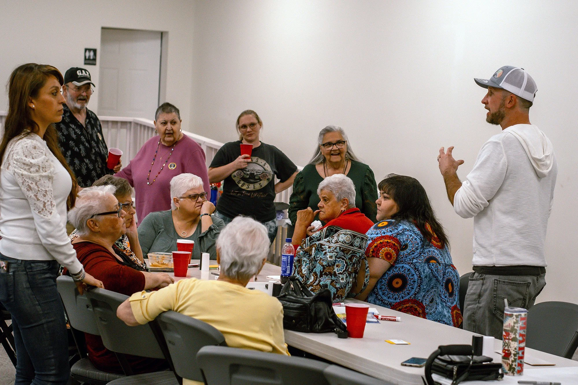 Michael Brydge and Nancy Sandoval Garcia hear from Monacan elders during their weekly elder’s lunch. Photo courtesy of Brittany Gordon, Middlebrook, VA.