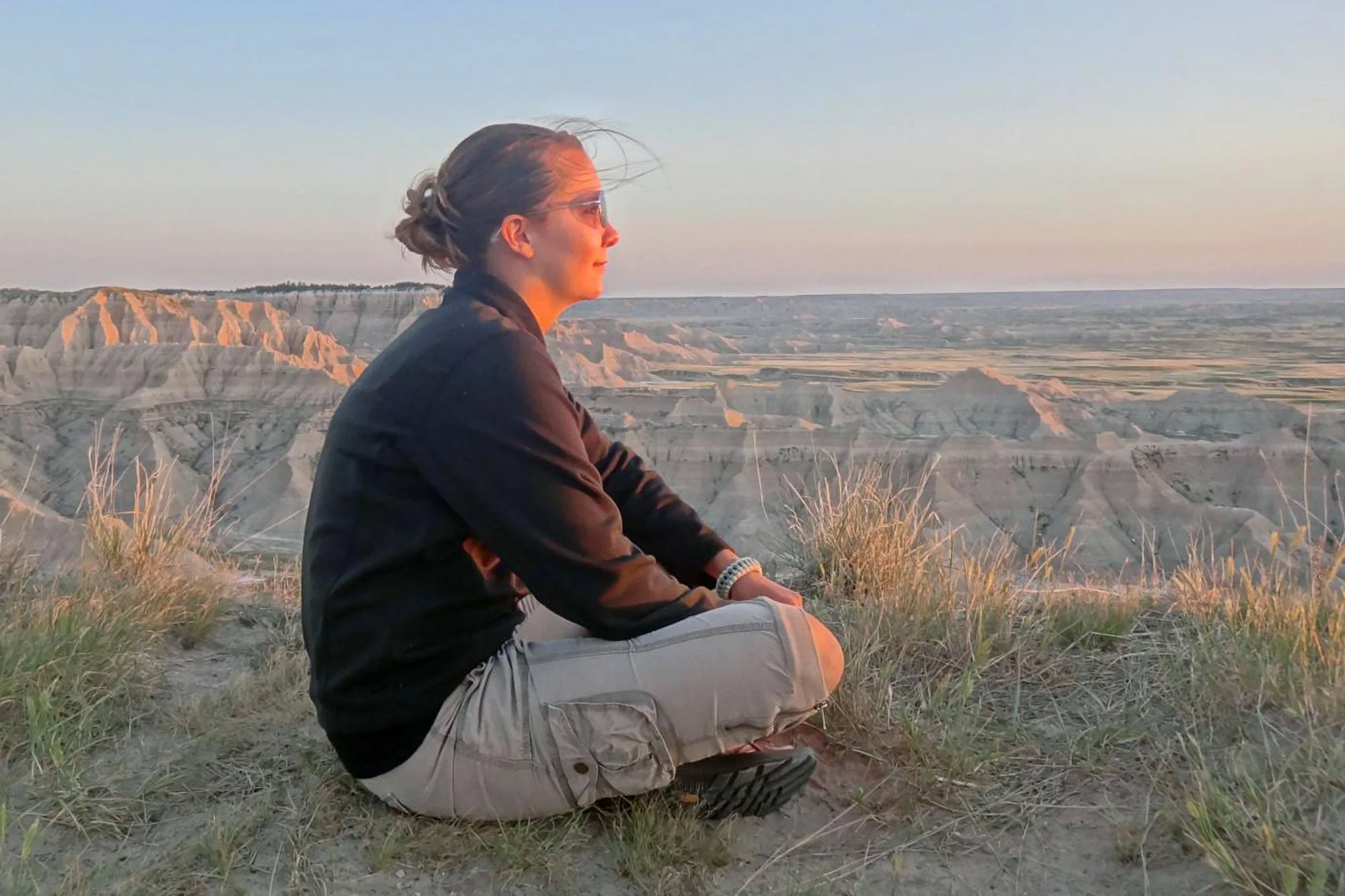 Andrea watches the sunset at Sheep Mountain Overlook on the South Unit of Badlands National Park in 2012.