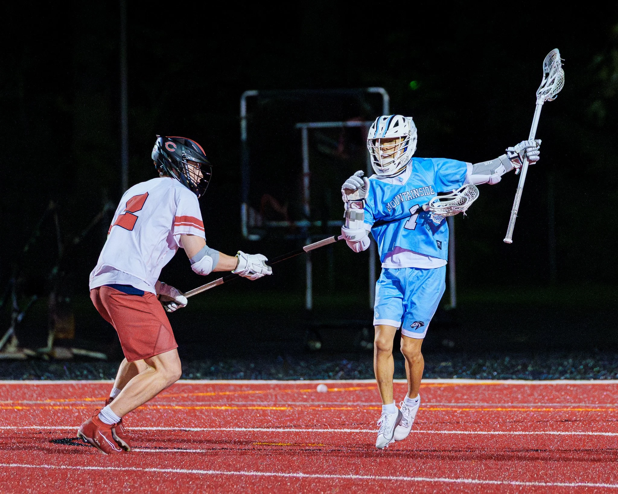Night games in the early spring can provide some cool visuals while at the same time being tricky to shoot in due to the poor lighting.  I love the challenge of making players look good in difficult conditions.