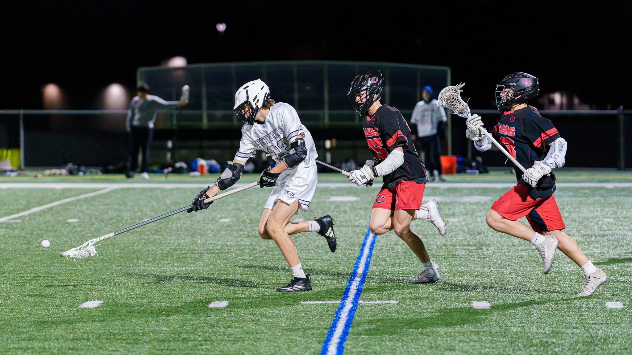 Their job is to hustle for the loose ball.  My job is to make sure I capture their efforts in images like these.