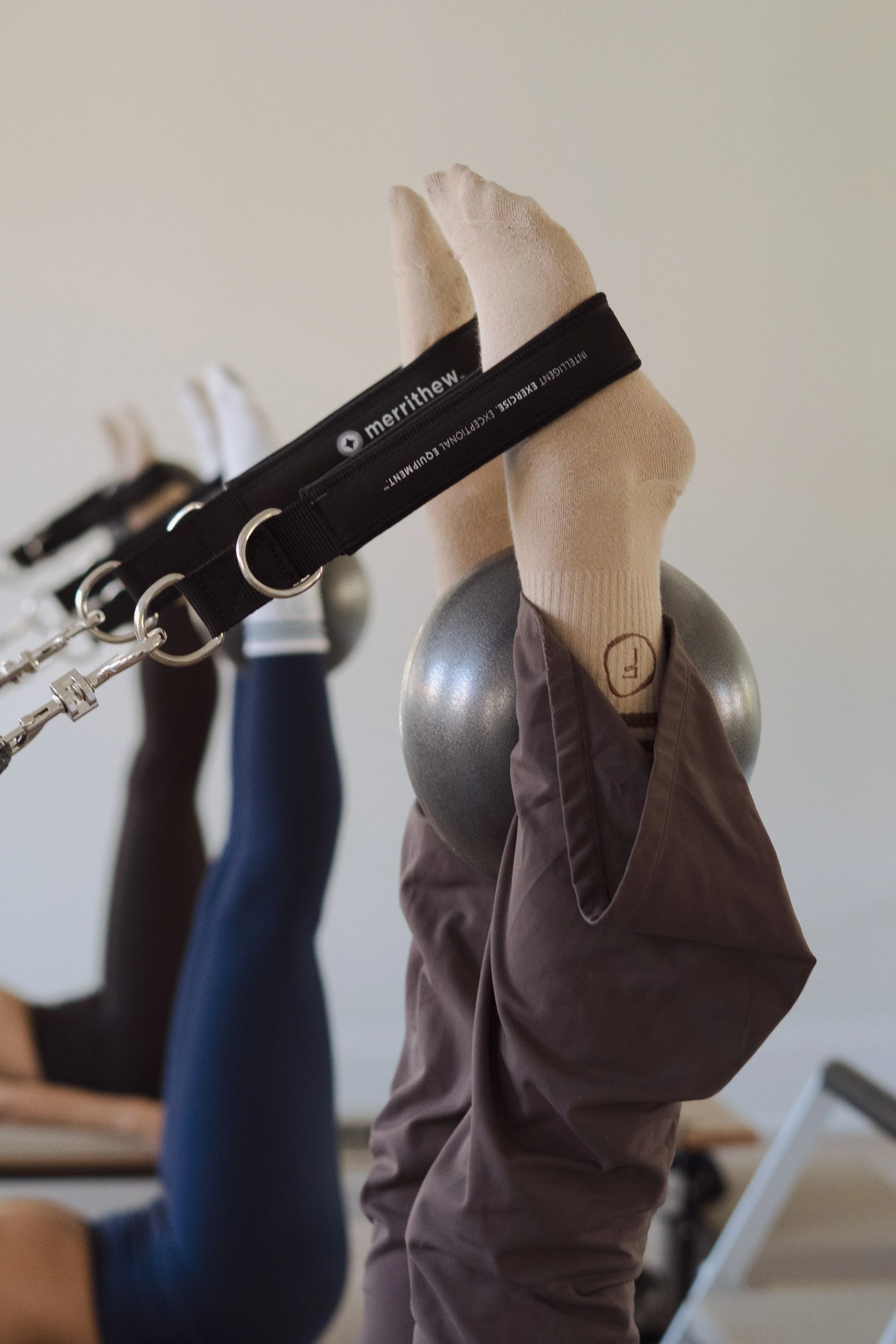 Feet in straps a classical Pilates move