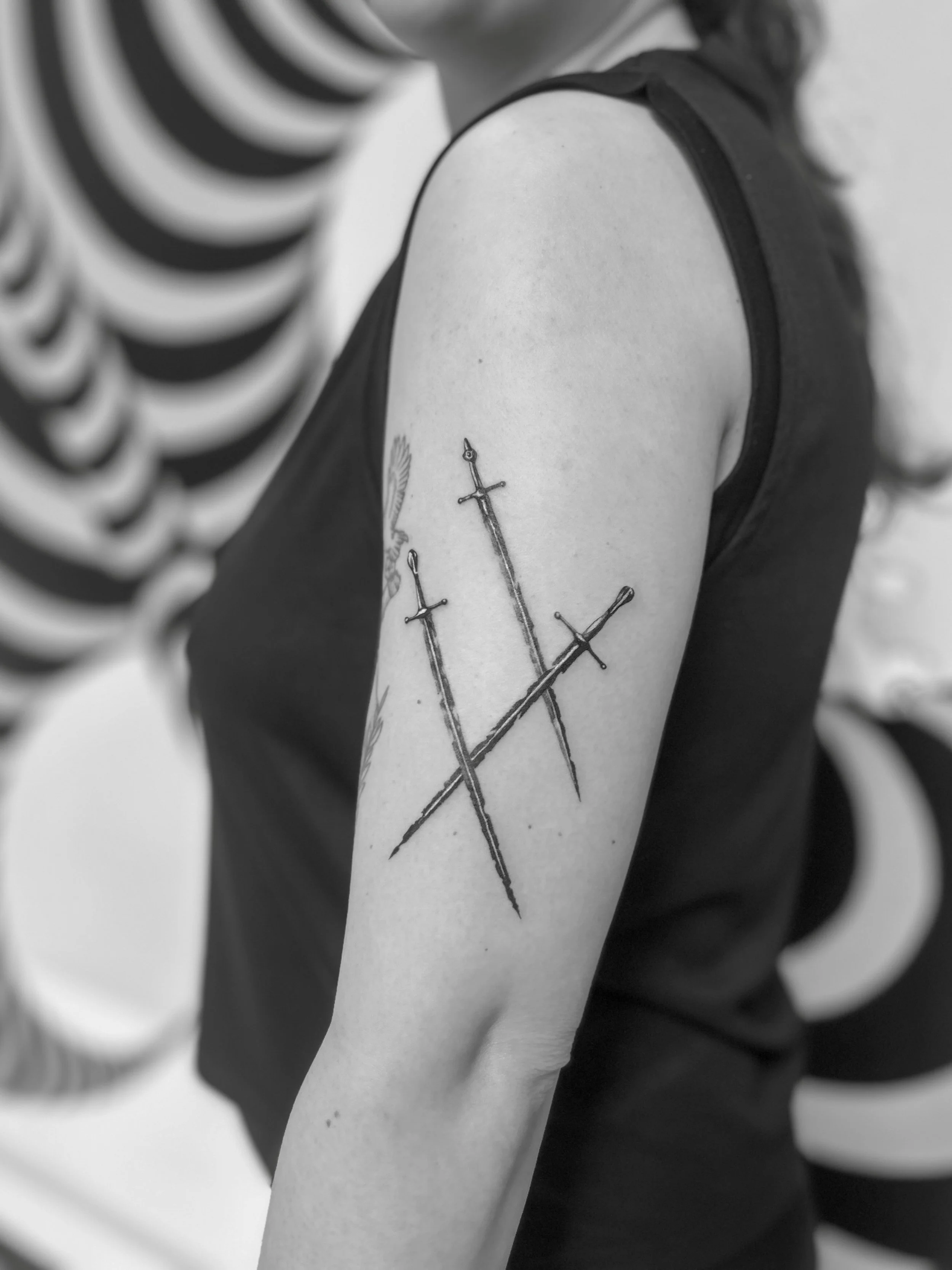 swords from my flash for Chloe ⚔️ always so lovely to see you, can&rsquo;t believe how tatted your arm is now since we did this one last year!! 

always excited to tattoo swords! fill out the form in my bio to book in your own sword tattoo 🖤 made @b