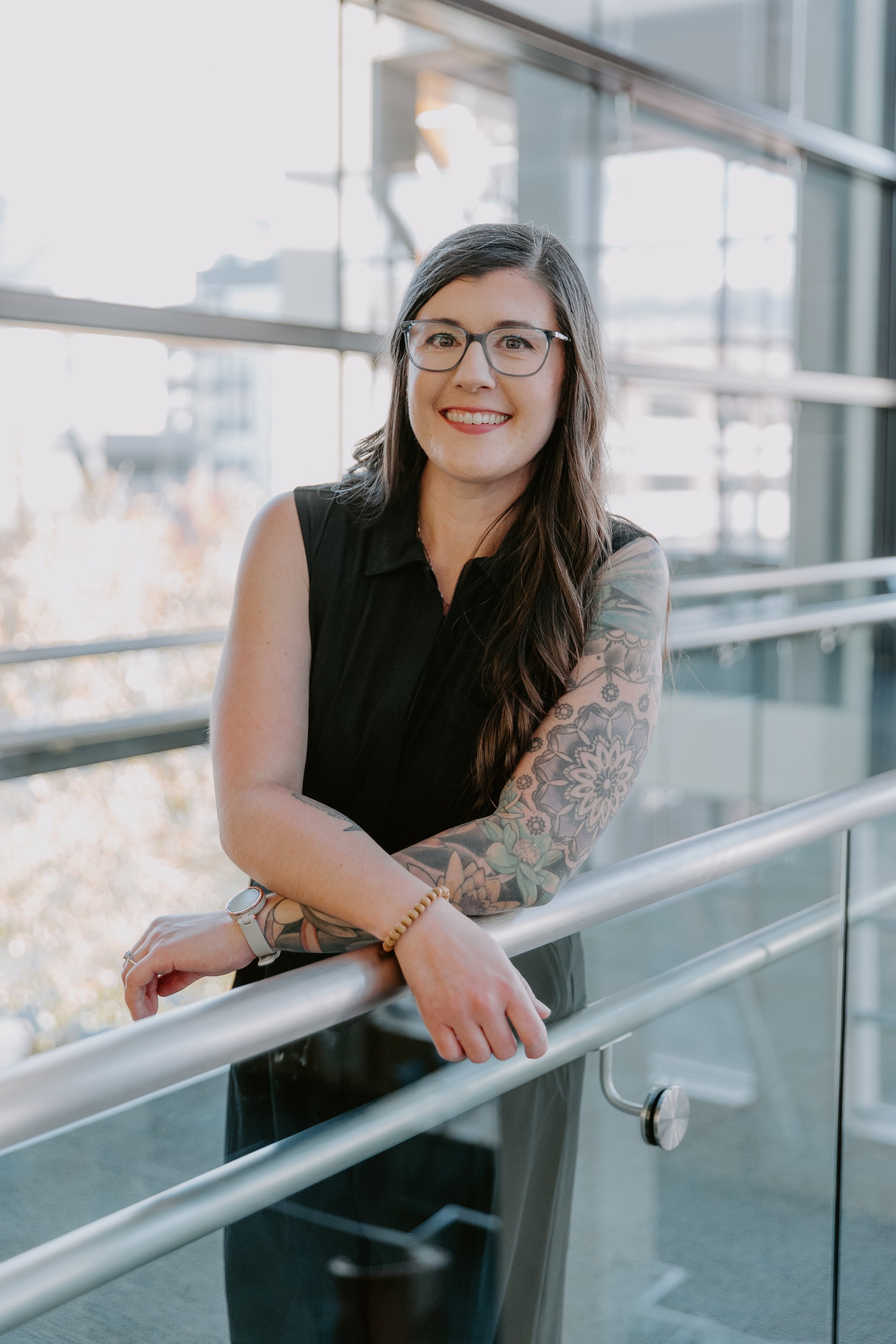 Rachel Warmath leaning forward smiling