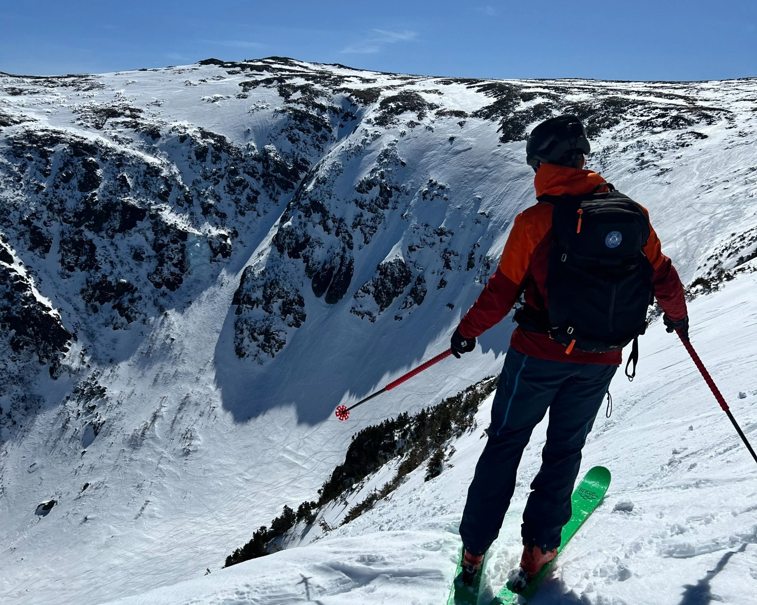 IFMGA guide leading skiers in Tuckerman Ravine, Mount Washington, NH