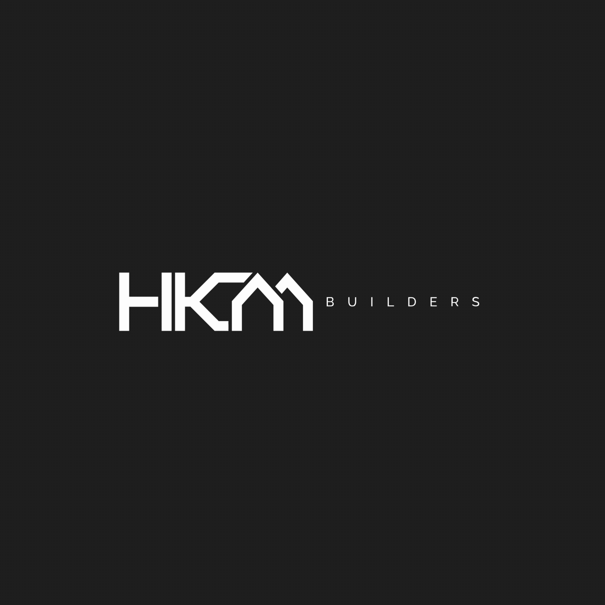 Logo of HKM Builders on a dark background