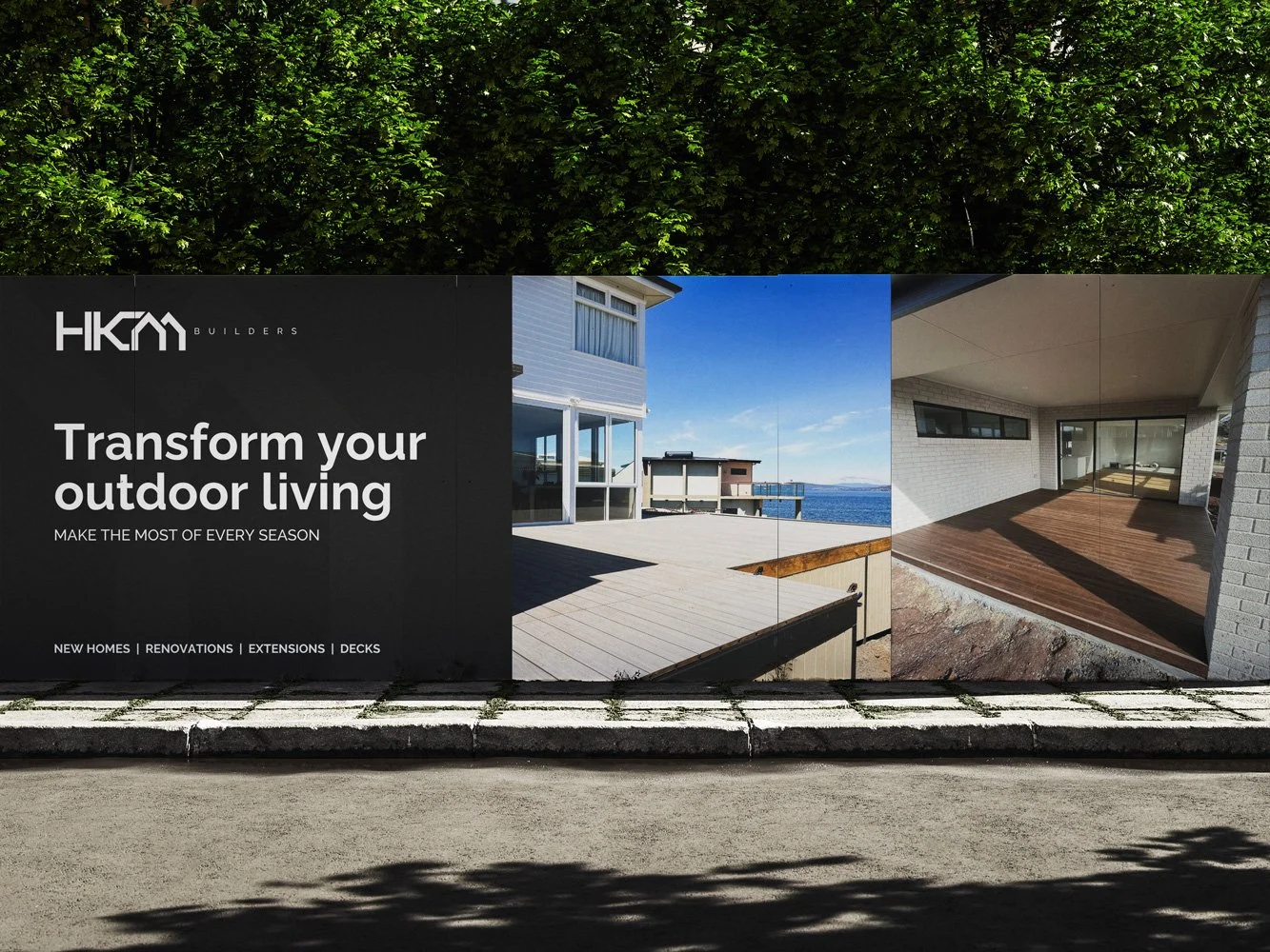 Billboard advertising outdoor living improvements showing images of a deck and patio with message to transform outdoor living for all seasons.