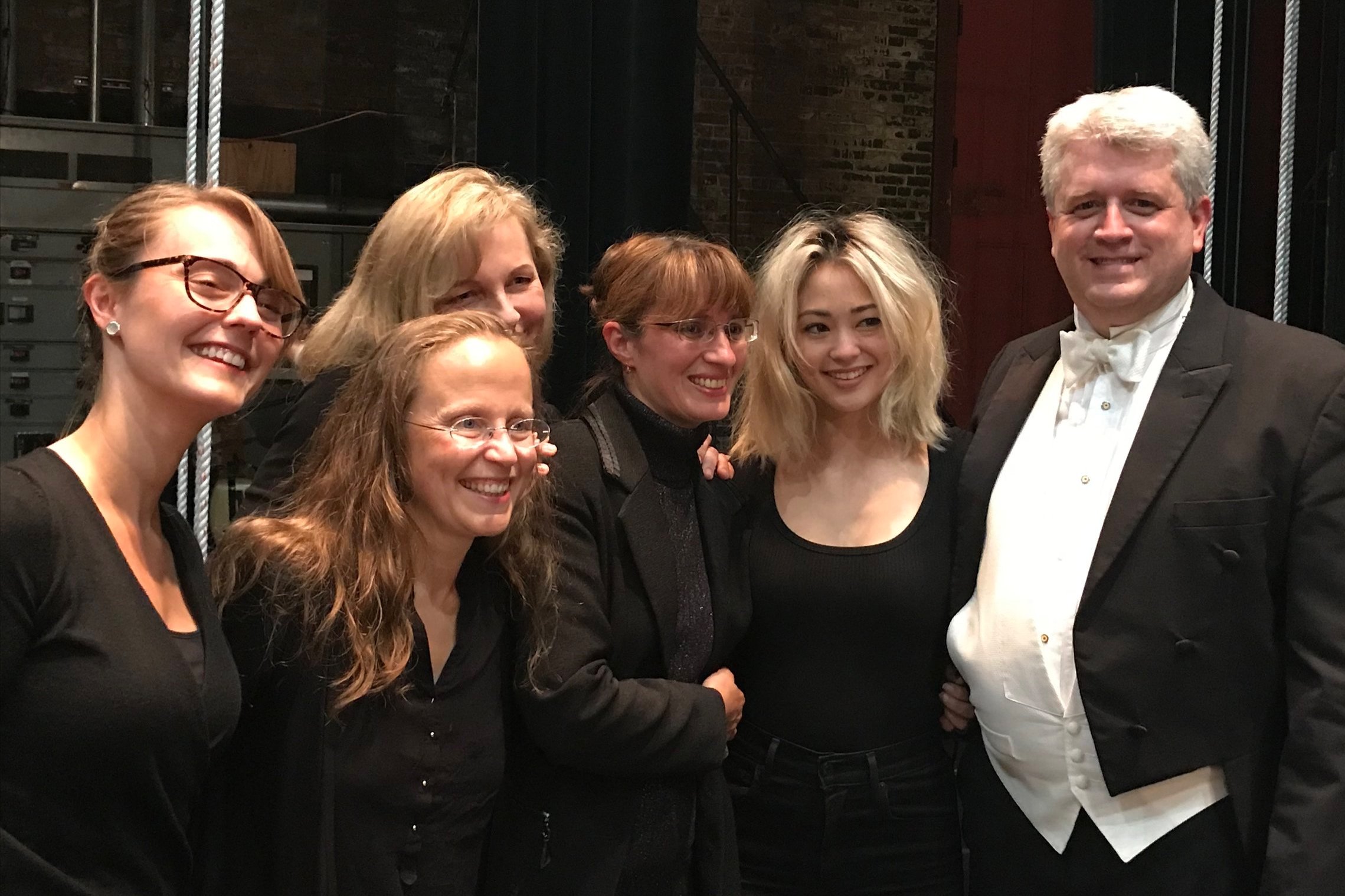 David backstage with orchestral musicians after a concert