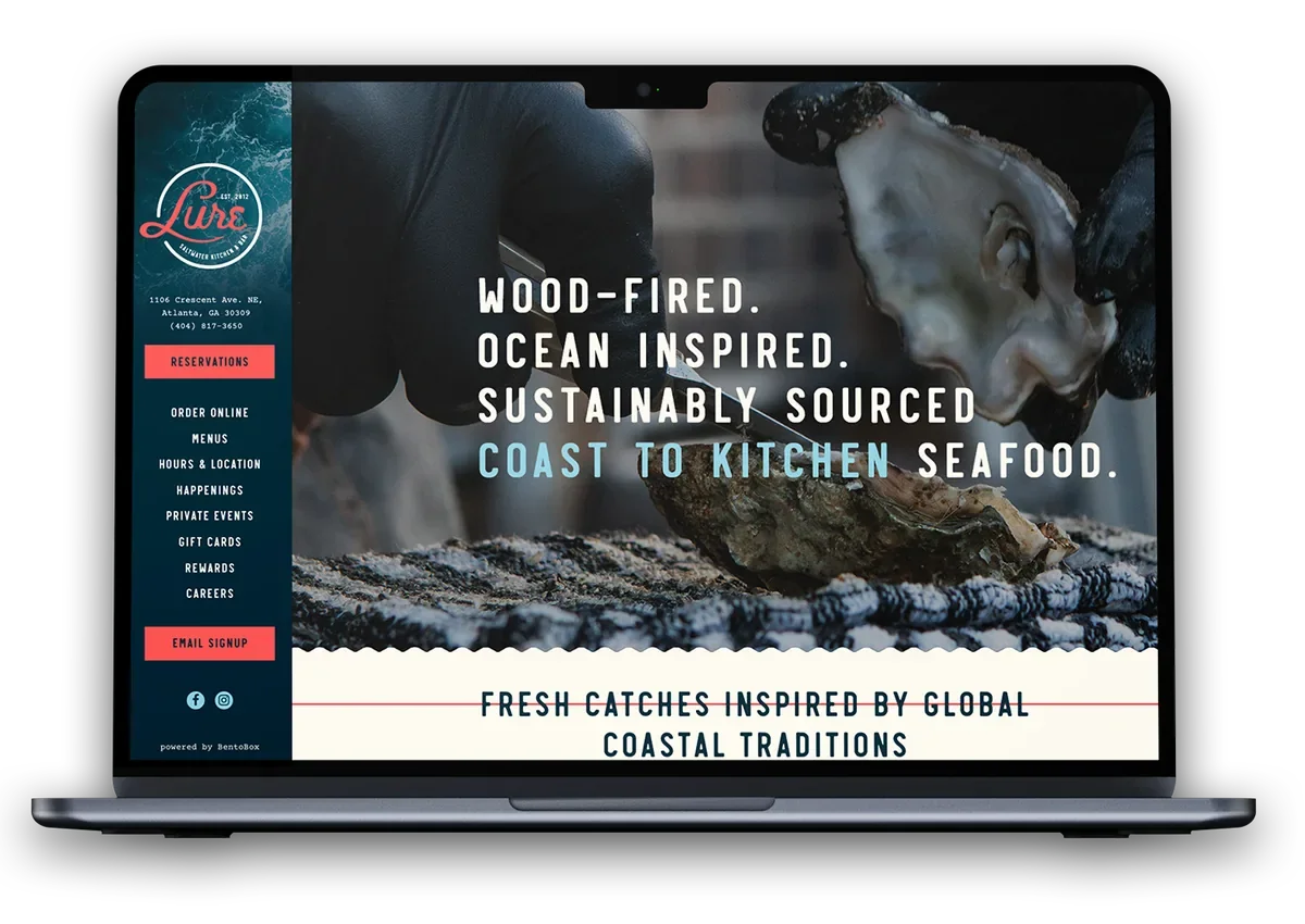Lure website on a laptop: "Wood-fired. Ocean inspired. Sustainably sourced. Coast to kitchen seafood."