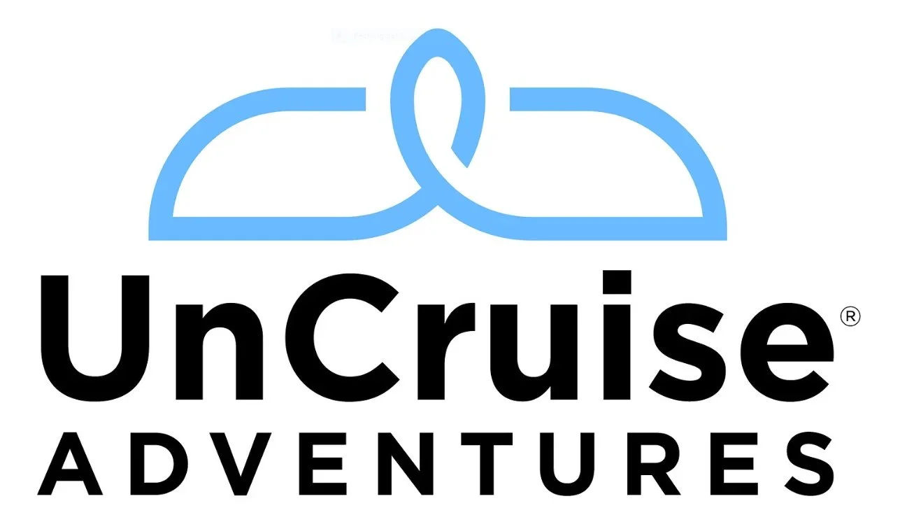 UnCruise_Logo-Traditional_White_1287x copy.jpg