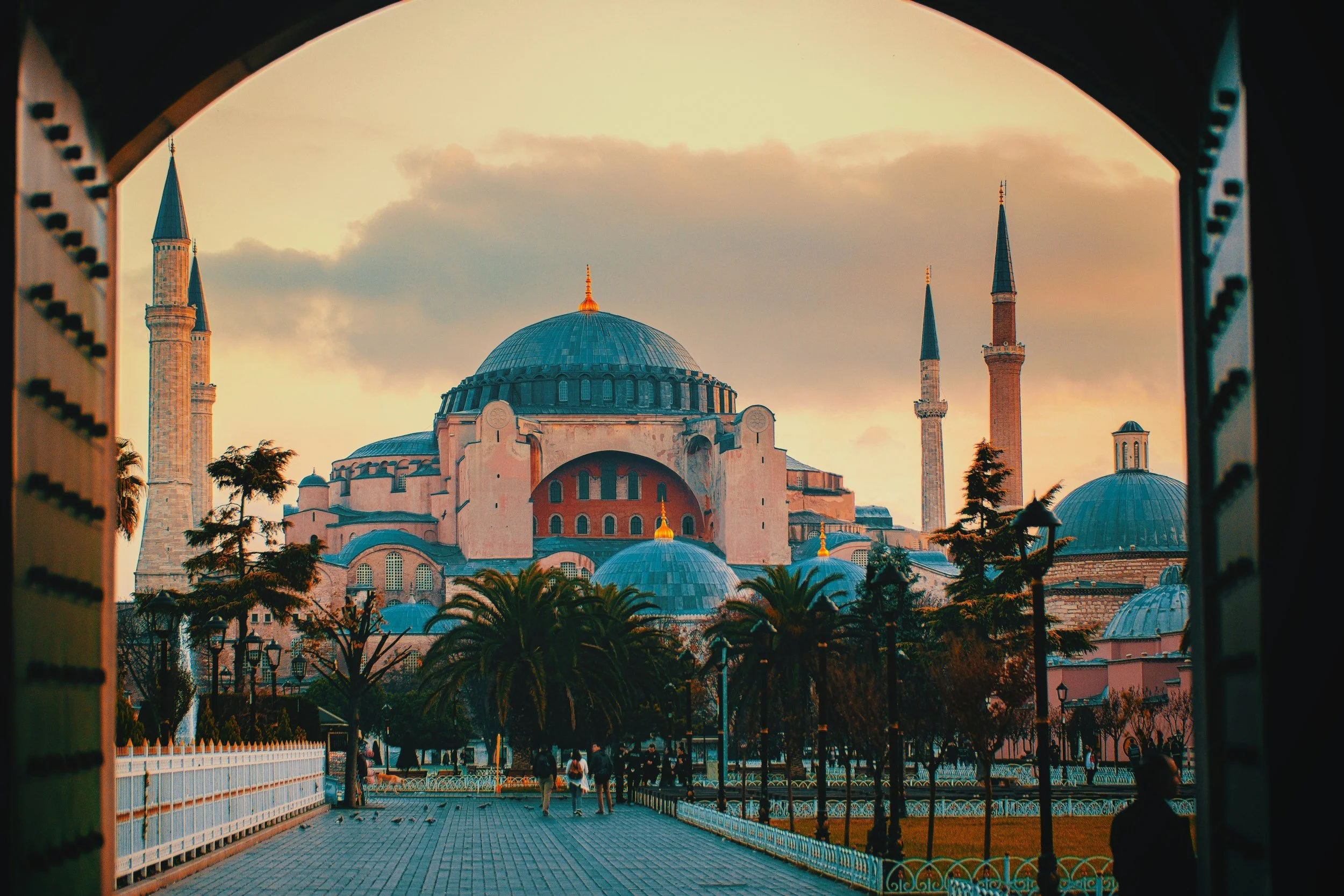The Hagia Sophia mosque framed by an archway at sunset on a private luxury tour of Istanbul, Turkey