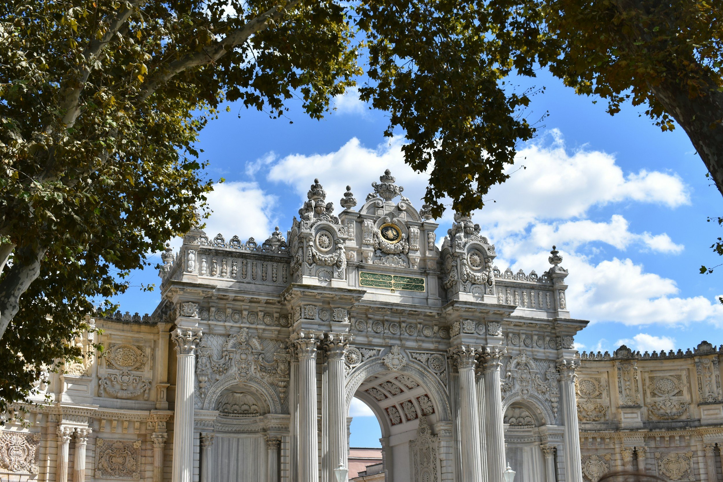 The ornate Baroque entrance gate of Dolmabahce Palace on the banks of the Bosphorus in Istanbul, Turkey