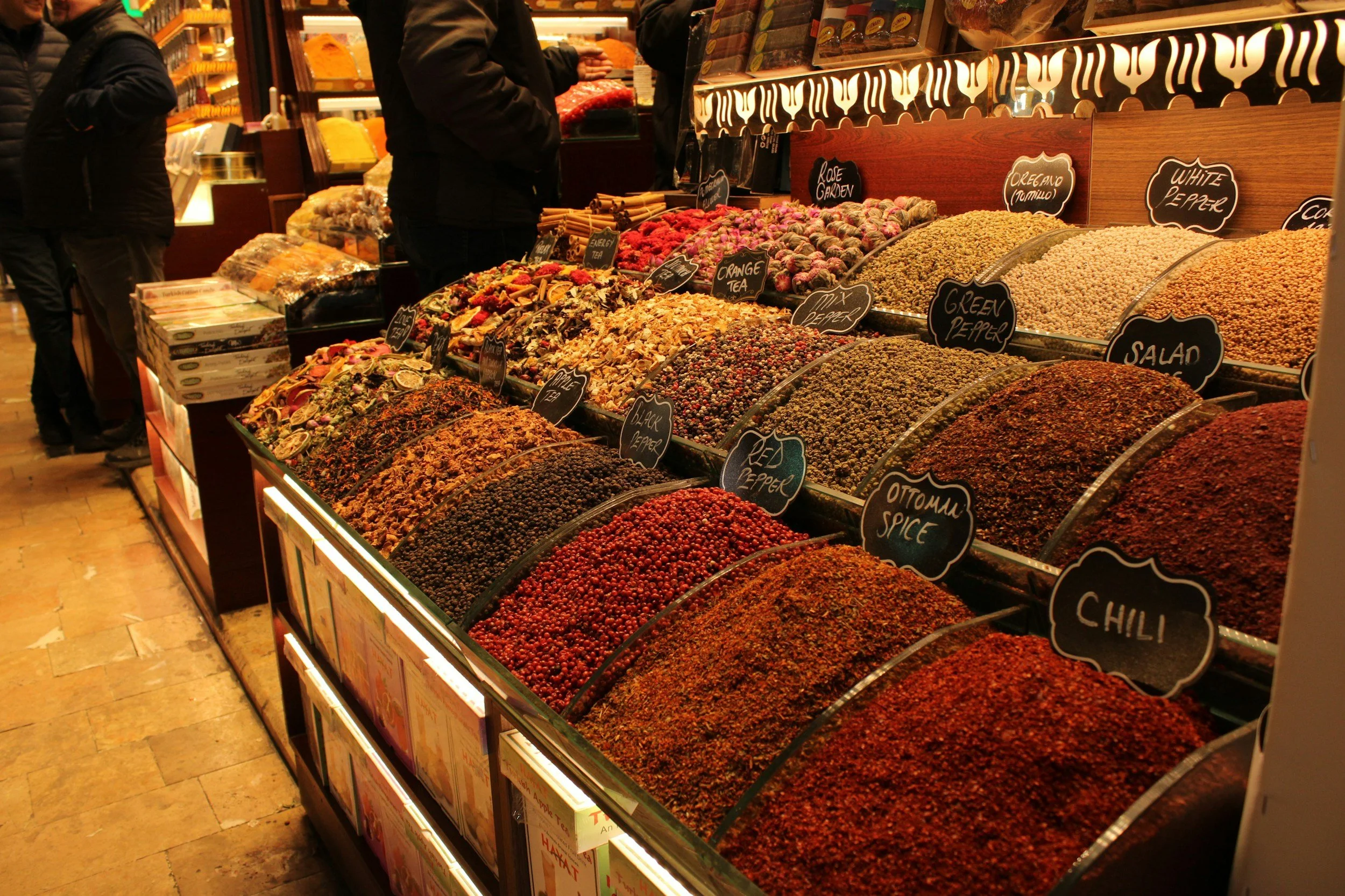 Colourful mounds of spices, teas and Ottoman spice blends on display at the Istanbul Spice Bazaar on a private food tour