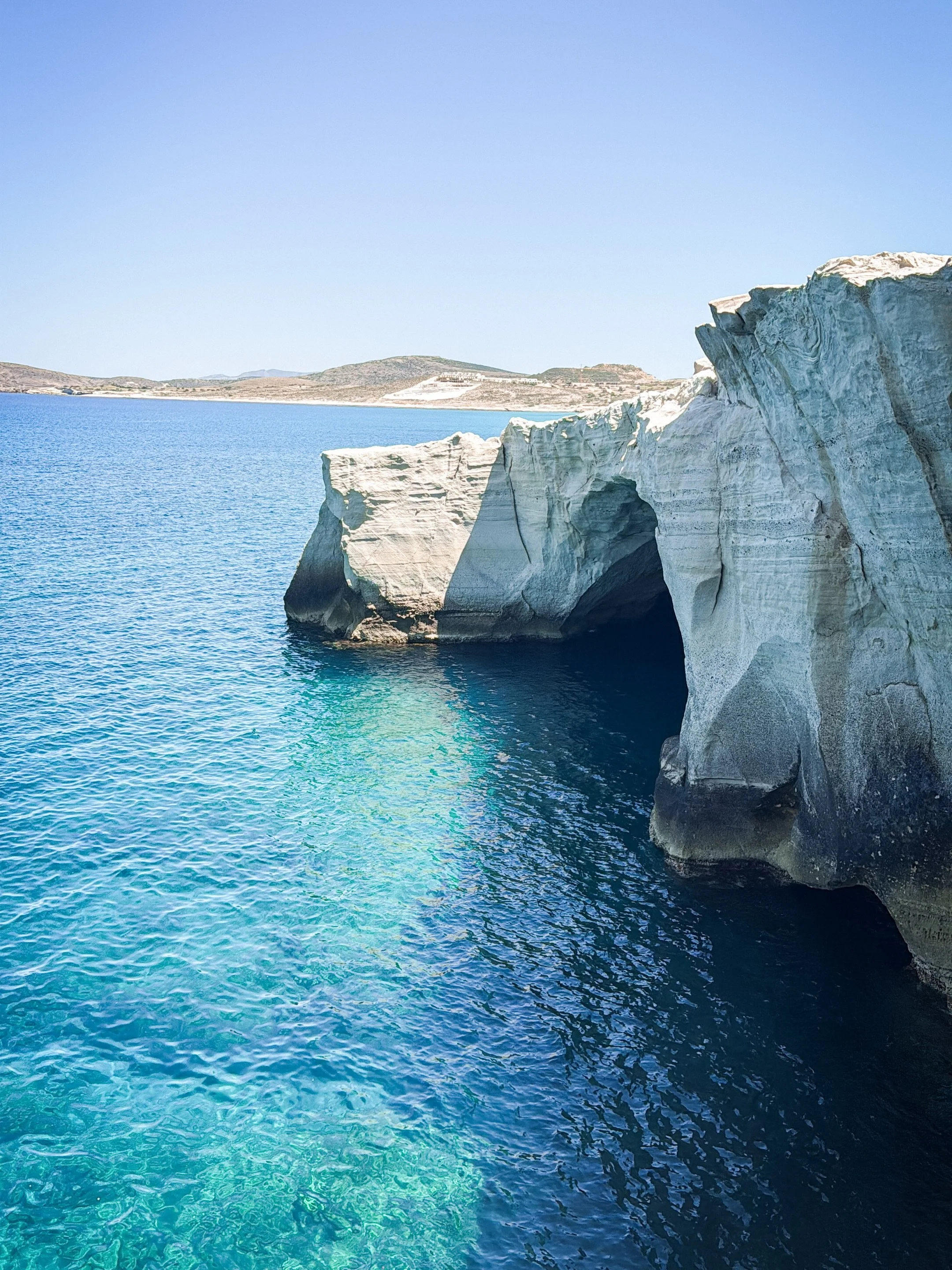 Where lunar landscapes meet sapphire waters. M&iacute;los is Greece&rsquo;s best-kept secret &mdash; and we&rsquo;d like to keep it that way. 🤍 #Milos #GreeceTravel #LuxuryTravel