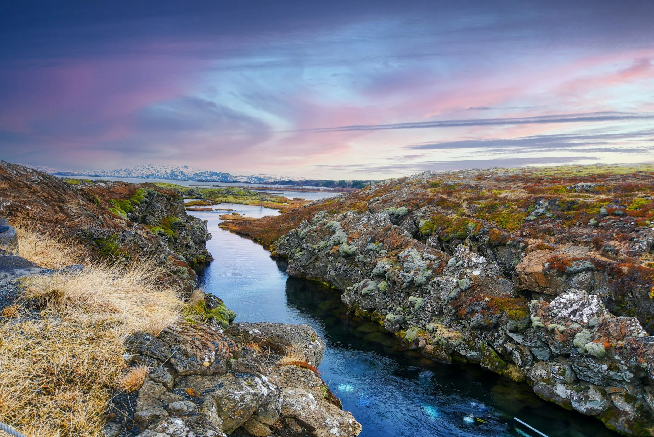 The crystal-clear Silfra fissure cutting through lava rock between the North American and Eurasian tectonic plates at Þingvellir, Iceland, one of the world's top diving sites