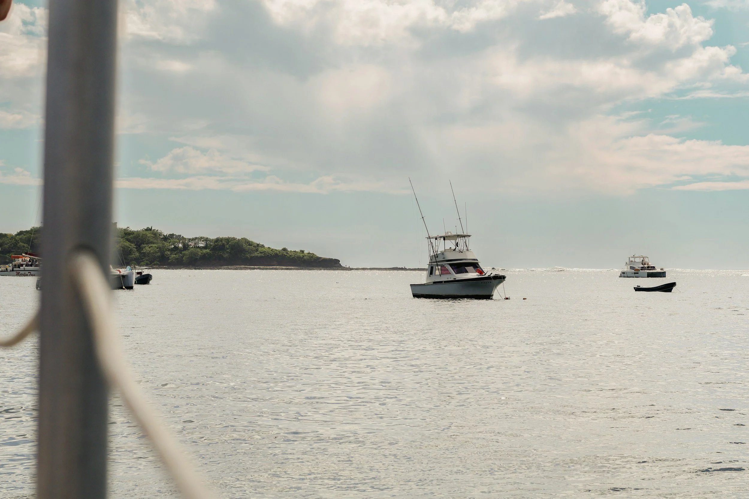 Private fishing boat anchored off a quiet beach along the Pacific coast of Costa Rica