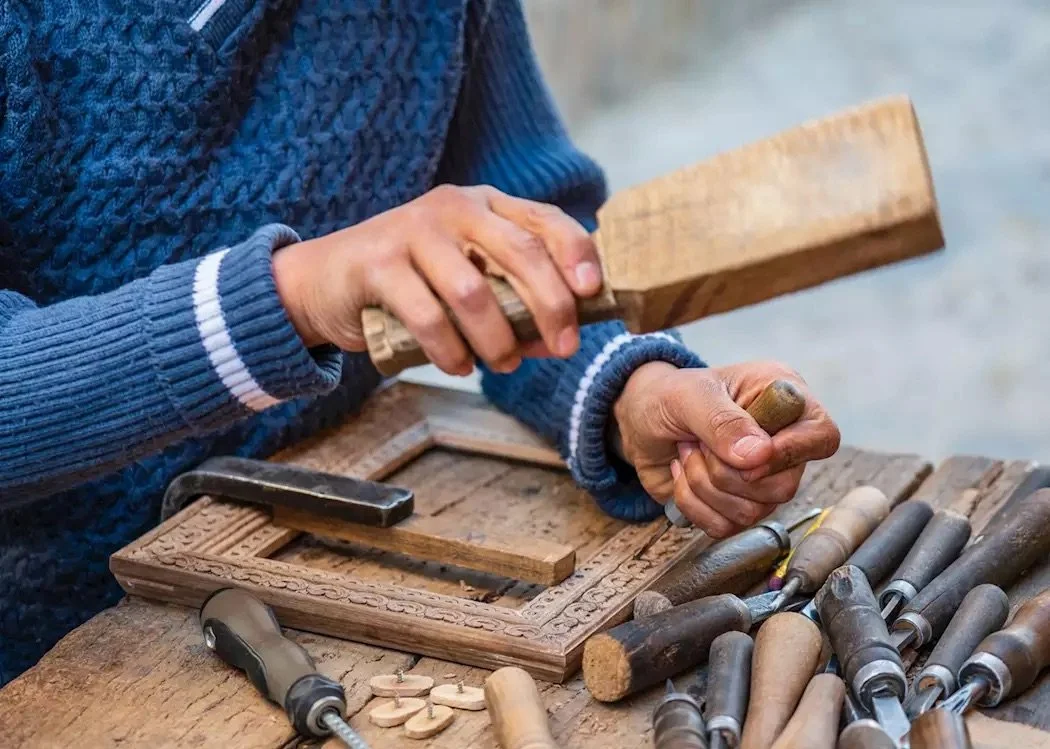 Khiva wood carving workshop local artisan Uzbekistan private cultural experience Silk Road