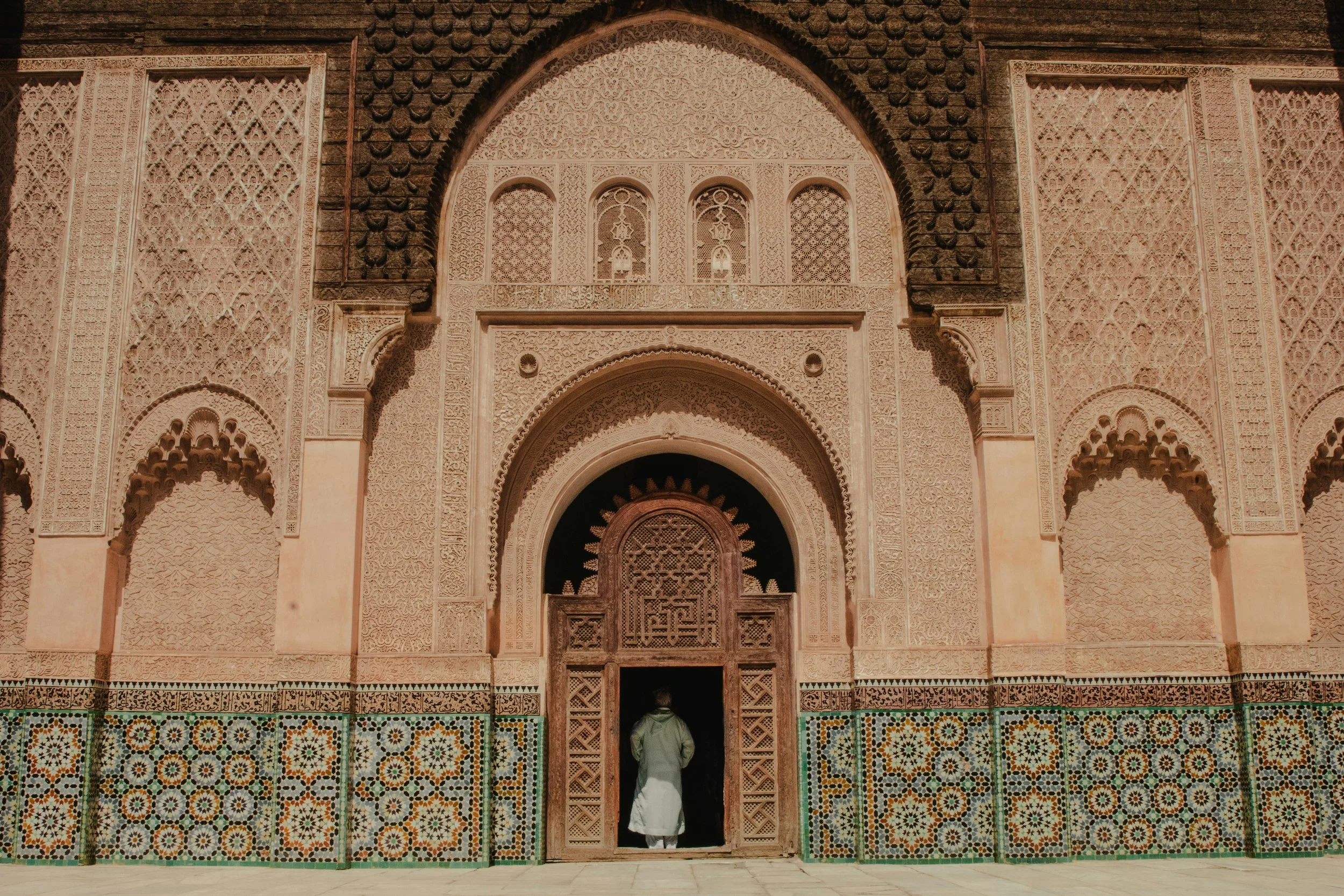 Colourful spice stalls and lanterns in the Marrakech medina on a private luxury tour