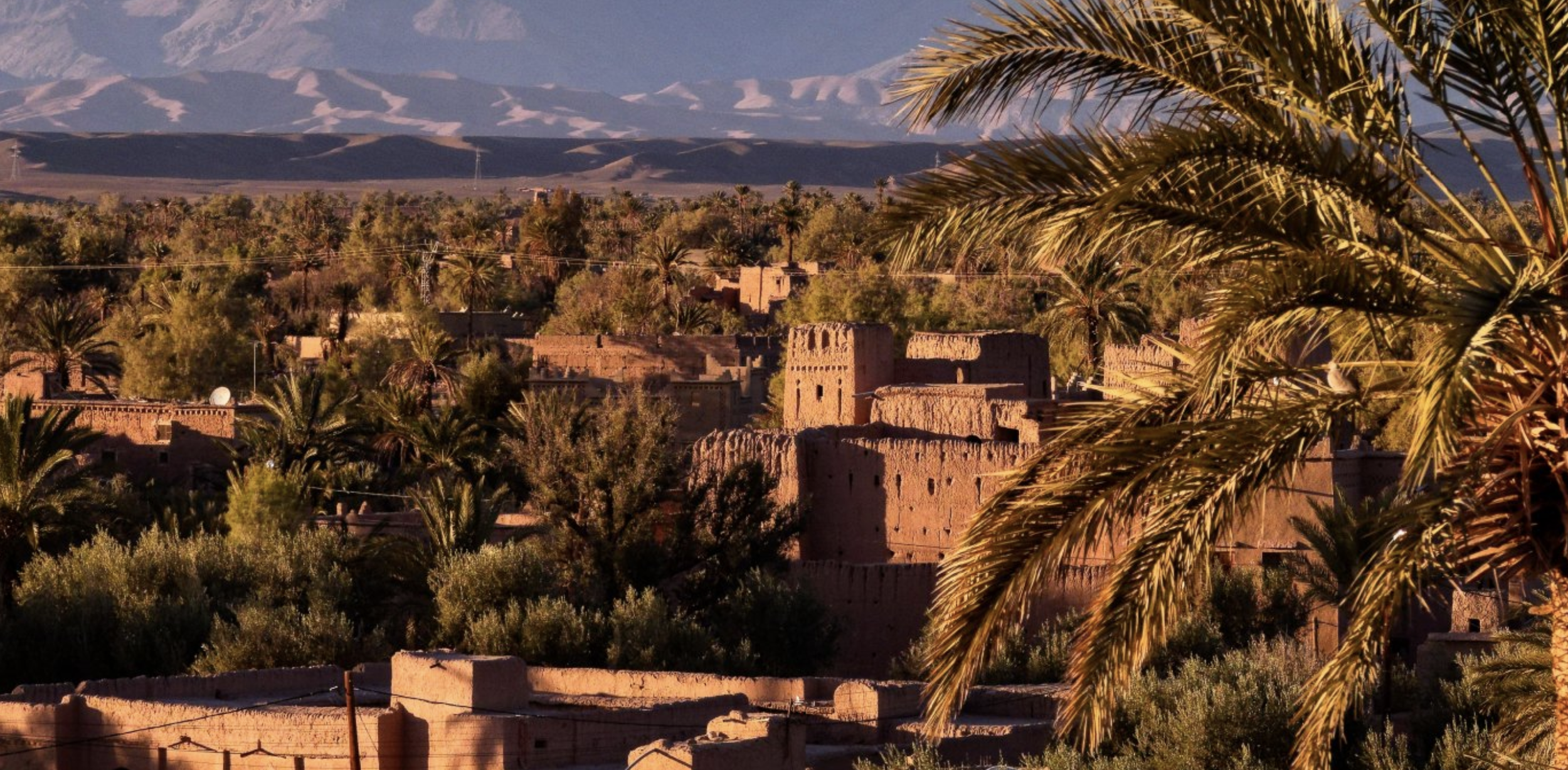 Ancient rose-red kasbah in the Draa Valley near Ouarzazate, southern Morocco