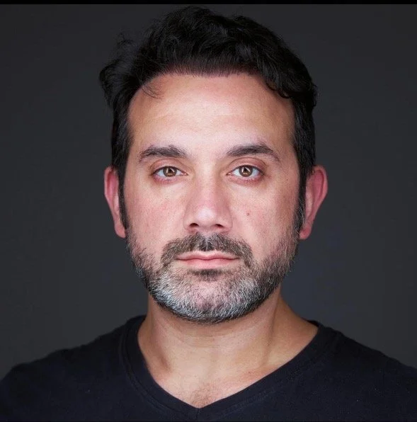 Professional headshot of Sadeq