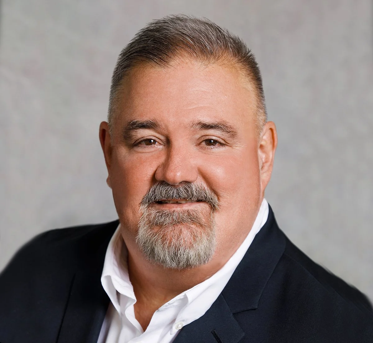 Professional headshot of James McNeely, AI governance expert