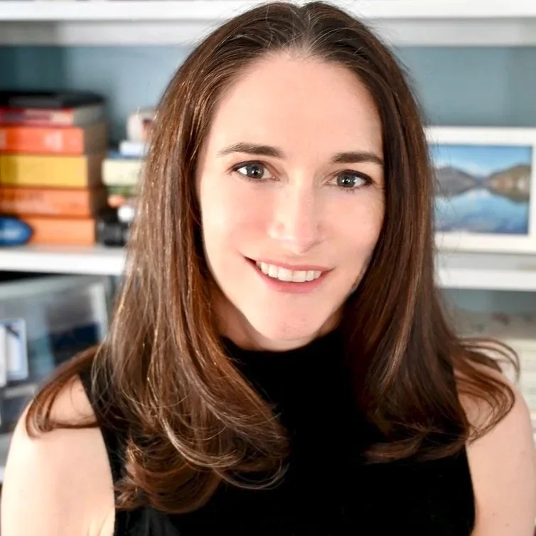 Professional headshot of Nora Gluch, executive and leadership coach