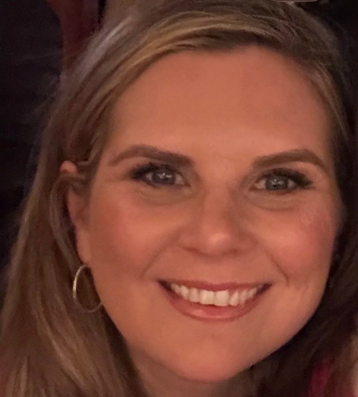 Professional headshot of Sara Pease, communications expert